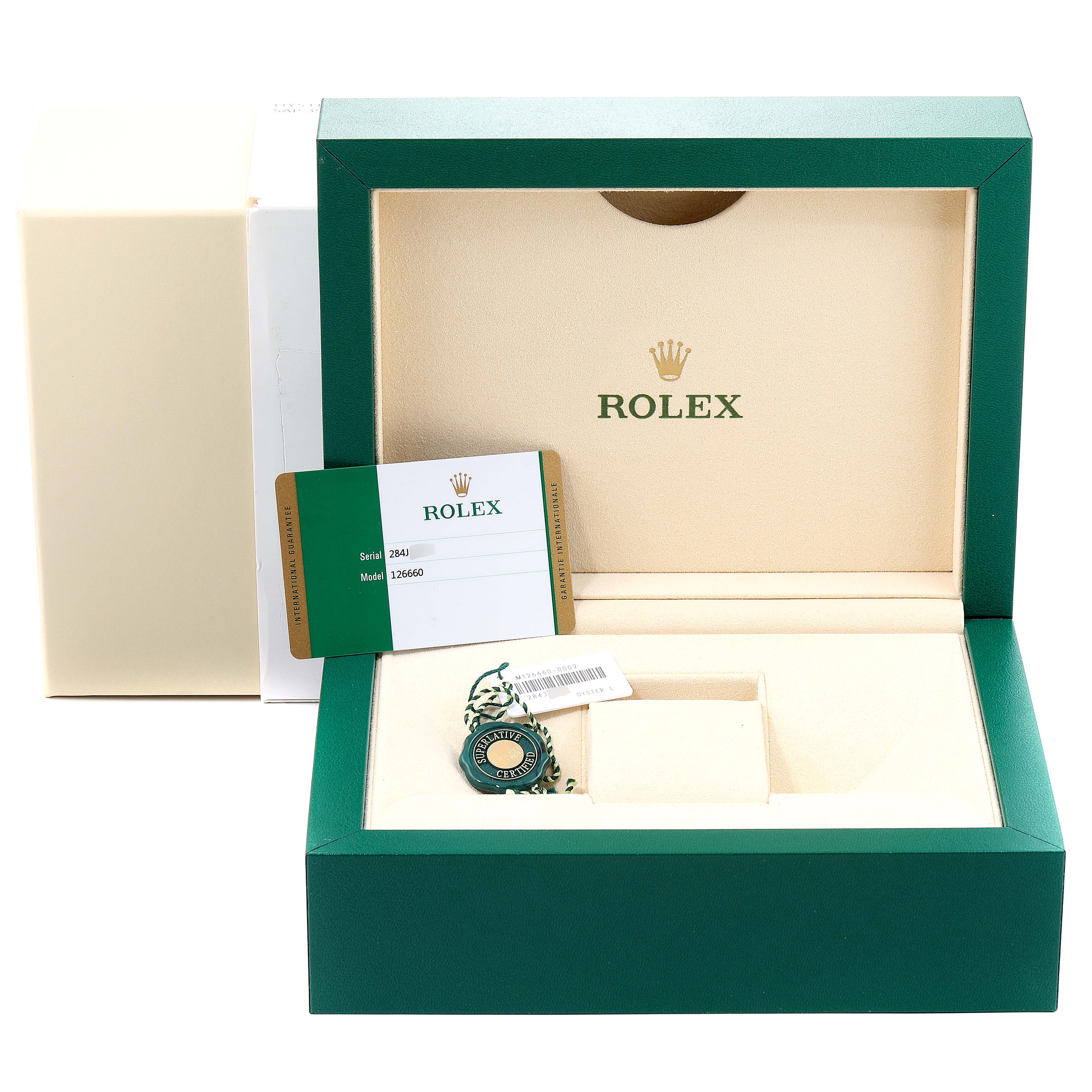 The image shows the box and accessories of a Rolex Sea-Dweller 126660 Men's Stainless Steel Blue Dial 126660 Men's Stainless Steel Blue Dial, including the certificate and tag, from a front angle.