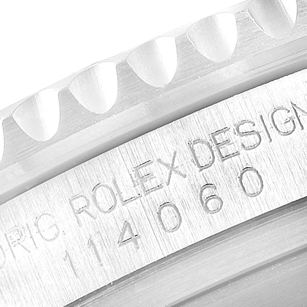This close-up angle shows the engraved details on the side of the bezel and case of a Rolex Submariner 114060 Men
s Stainless Steel Black Dial 114060 Men
s Stainless Steel Black Dial watch.