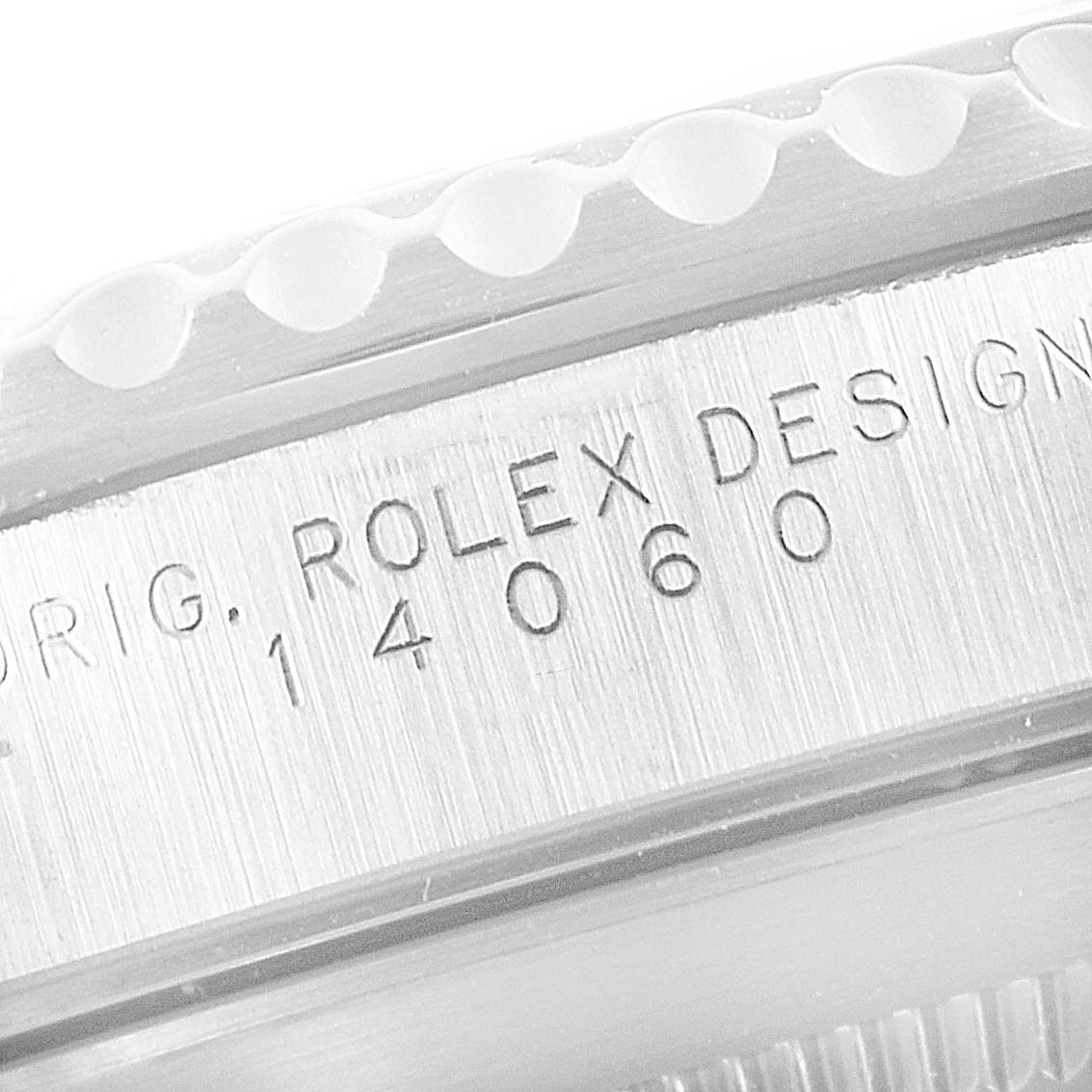 This image shows a close-up view of the case side and bezel of the Rolex Submariner 14060 Men
s Stainless Steel Black Dial 14060 Men
s Stainless Steel Black Dial model, displaying its engraved design number 14060.