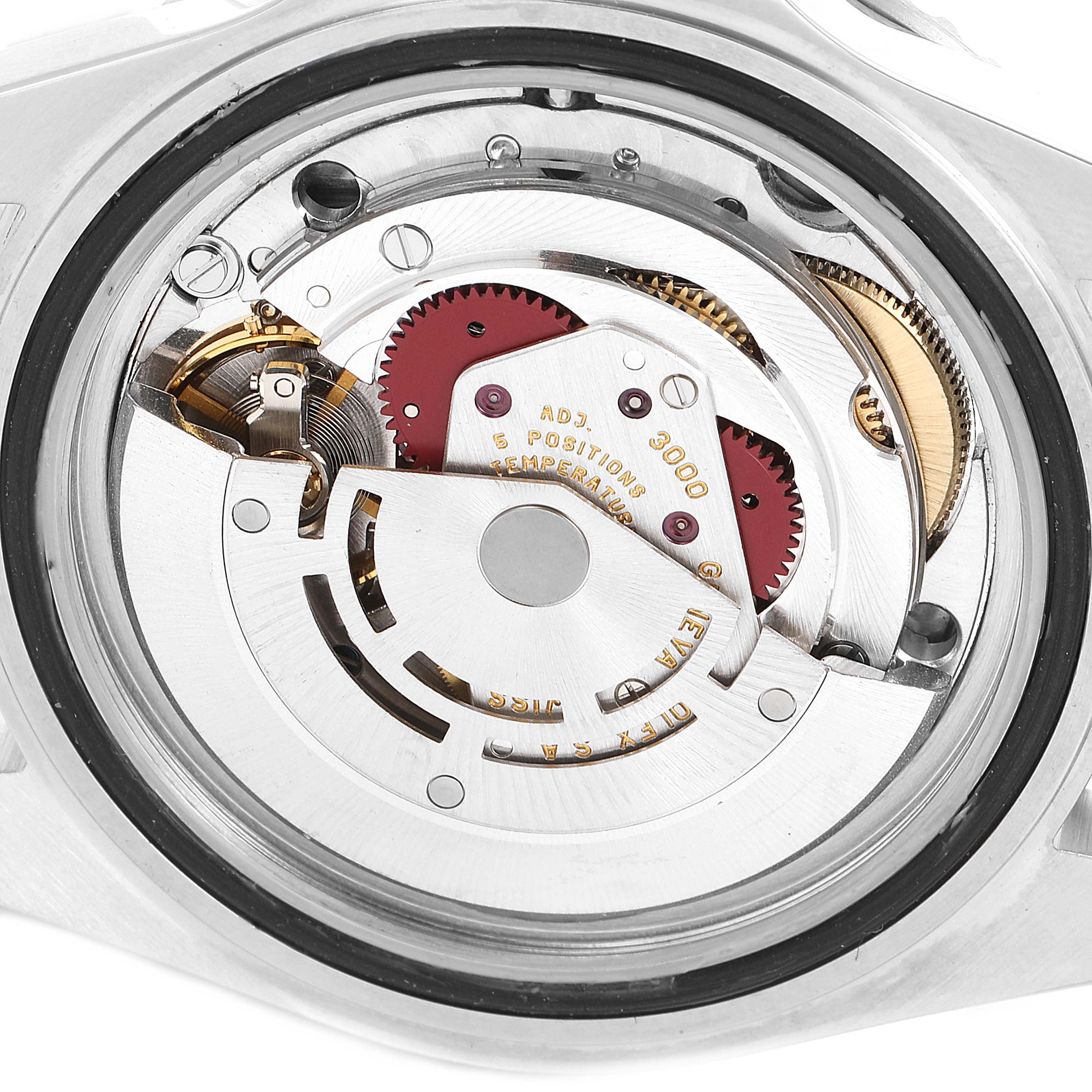 This close-up image shows the intricate internal movement of the Rolex Submariner 14060 Men
s Stainless Steel Black Dial 14060 Men
s Stainless Steel Black Dial model watch.