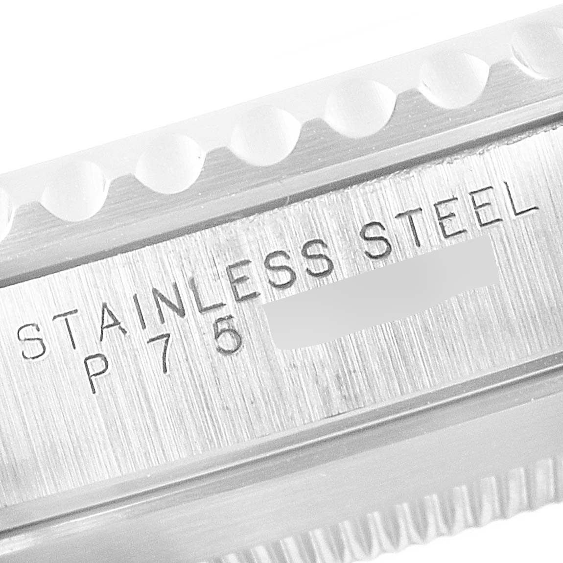 This is a close-up shot of the stainless steel case back of a Rolex Submariner 14060 Men
s Stainless Steel Black Dial 14060 Men
s Stainless Steel Black Dial model.