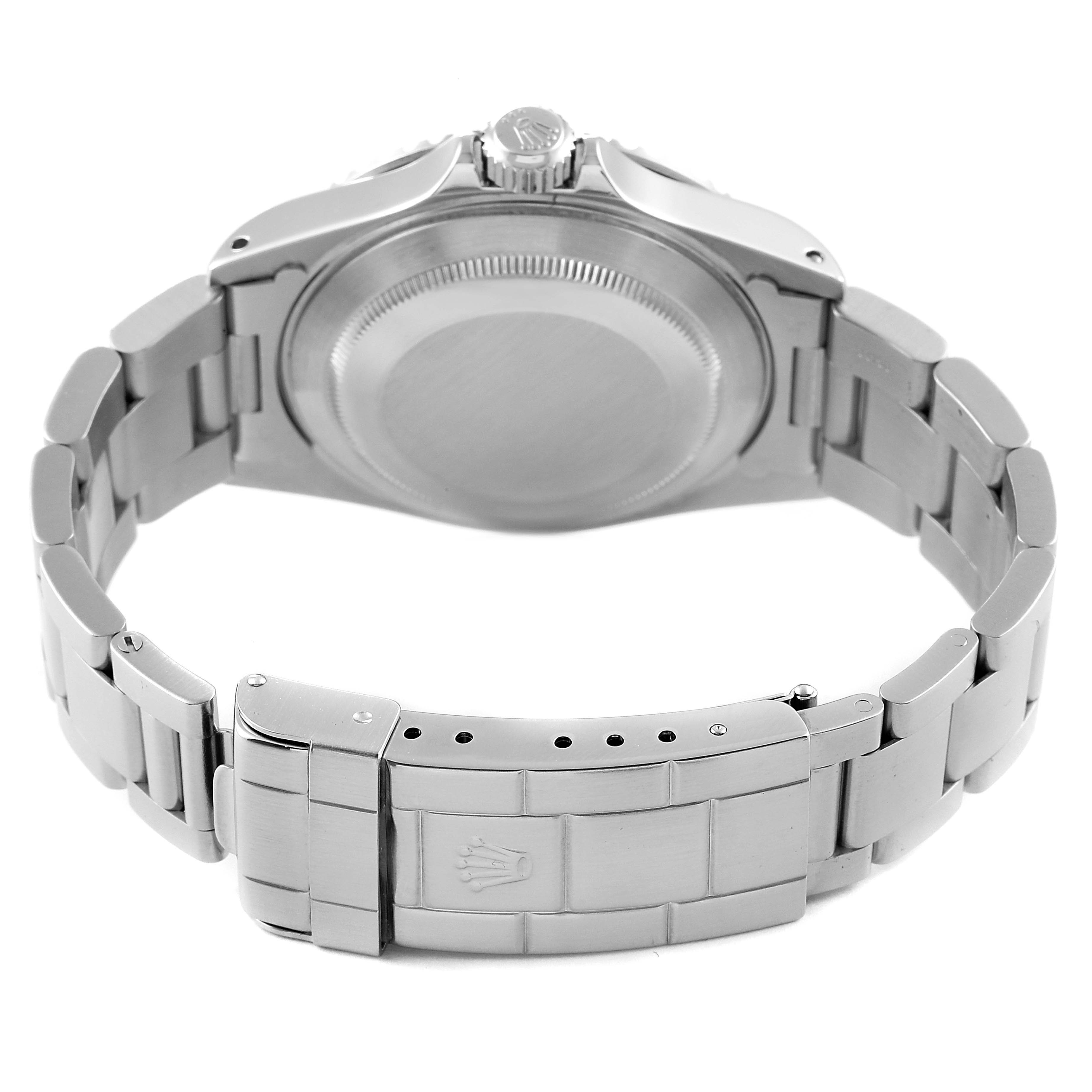 The image shows the back view of a Rolex Submariner 14060 Men
s Stainless Steel Black Dial 14060 Men
s Stainless Steel Black Dial watch, highlighting the case back and bracelet.