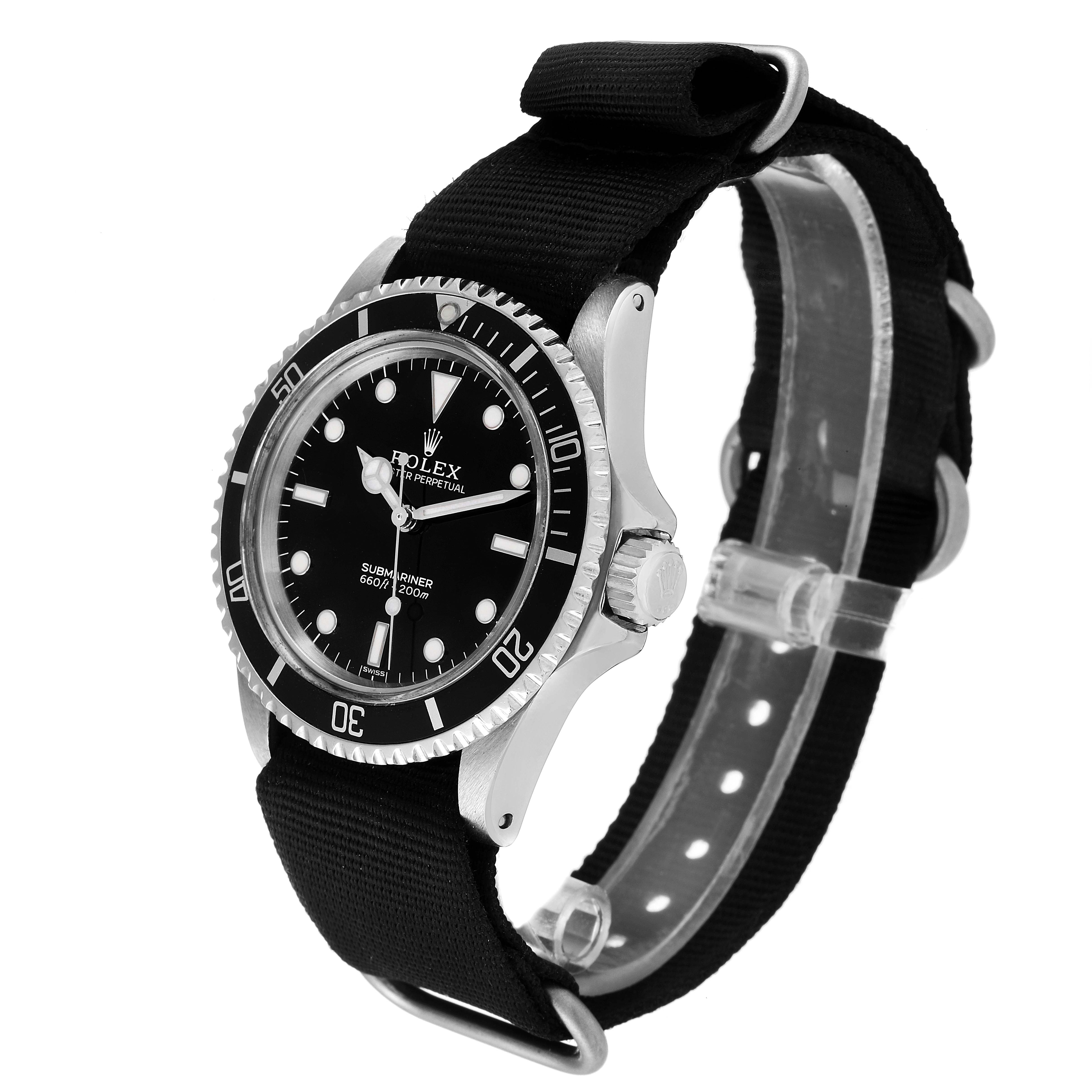 The Rolex Vintage Collection 5513 Men
s Stainless Steel Black Dial 5513 Men
s Stainless Steel Black Dial watch is shown at a three-quarter angle, highlighting the dial, bezel, and black fabric strap.