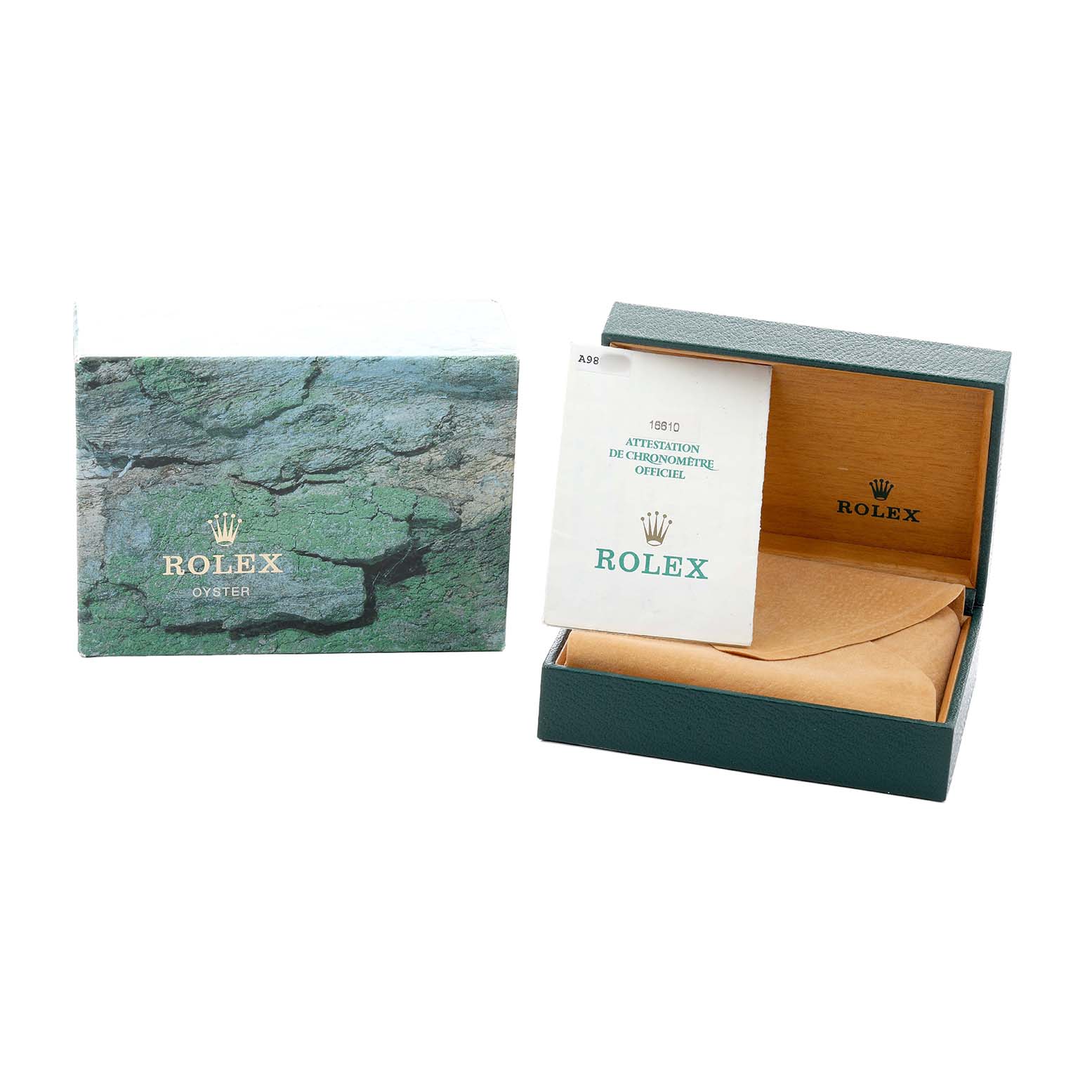 The image shows a Rolex Submariner 16610 Men's Stainless Steel Black Dial box, an outer sleeve with a stone pattern, and a booklet angled slightly open.