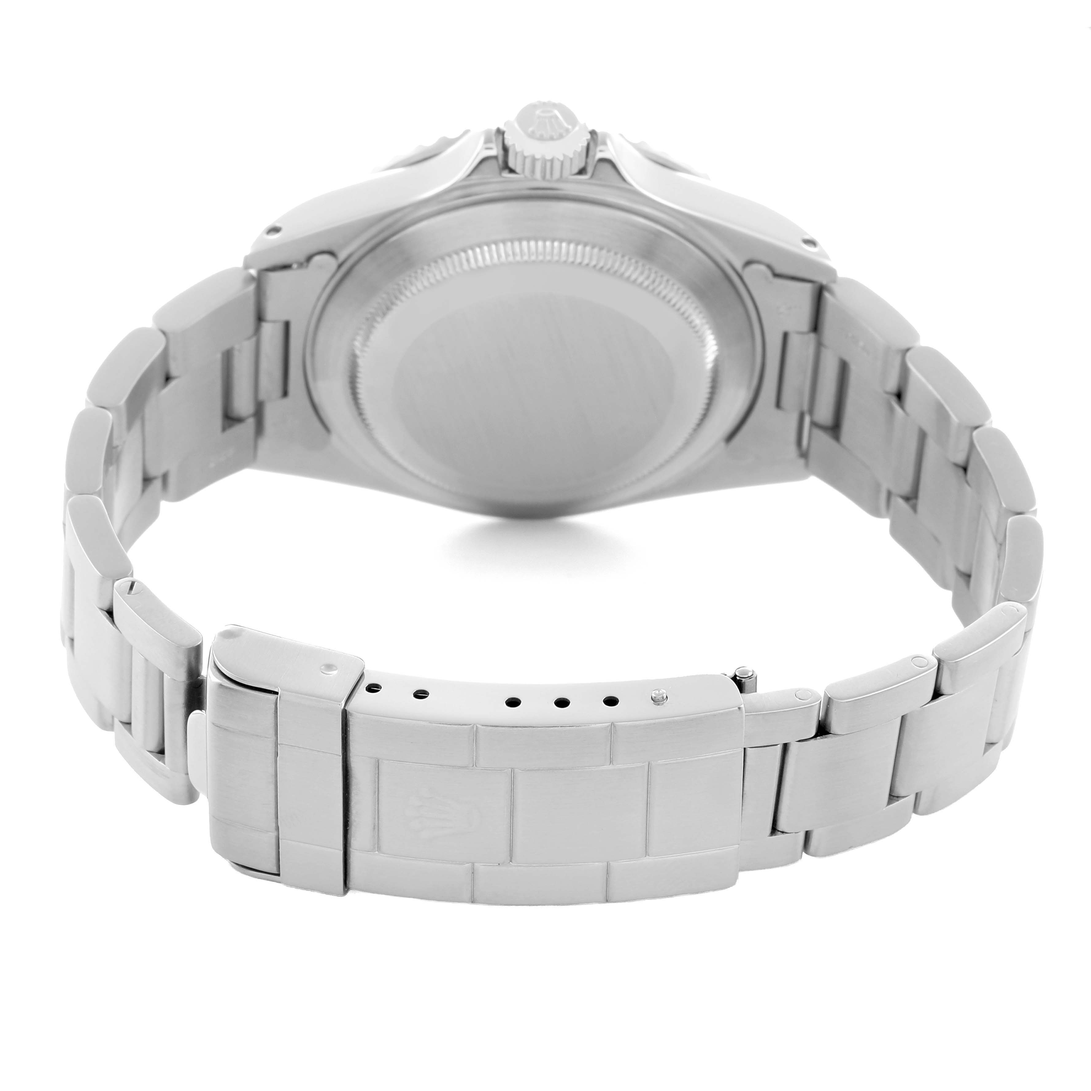 The Rolex Submariner 14060M Men
s Stainless Steel Black Dial is shown from the back, highlighting the case back, bracelet, and clasp of the watch.