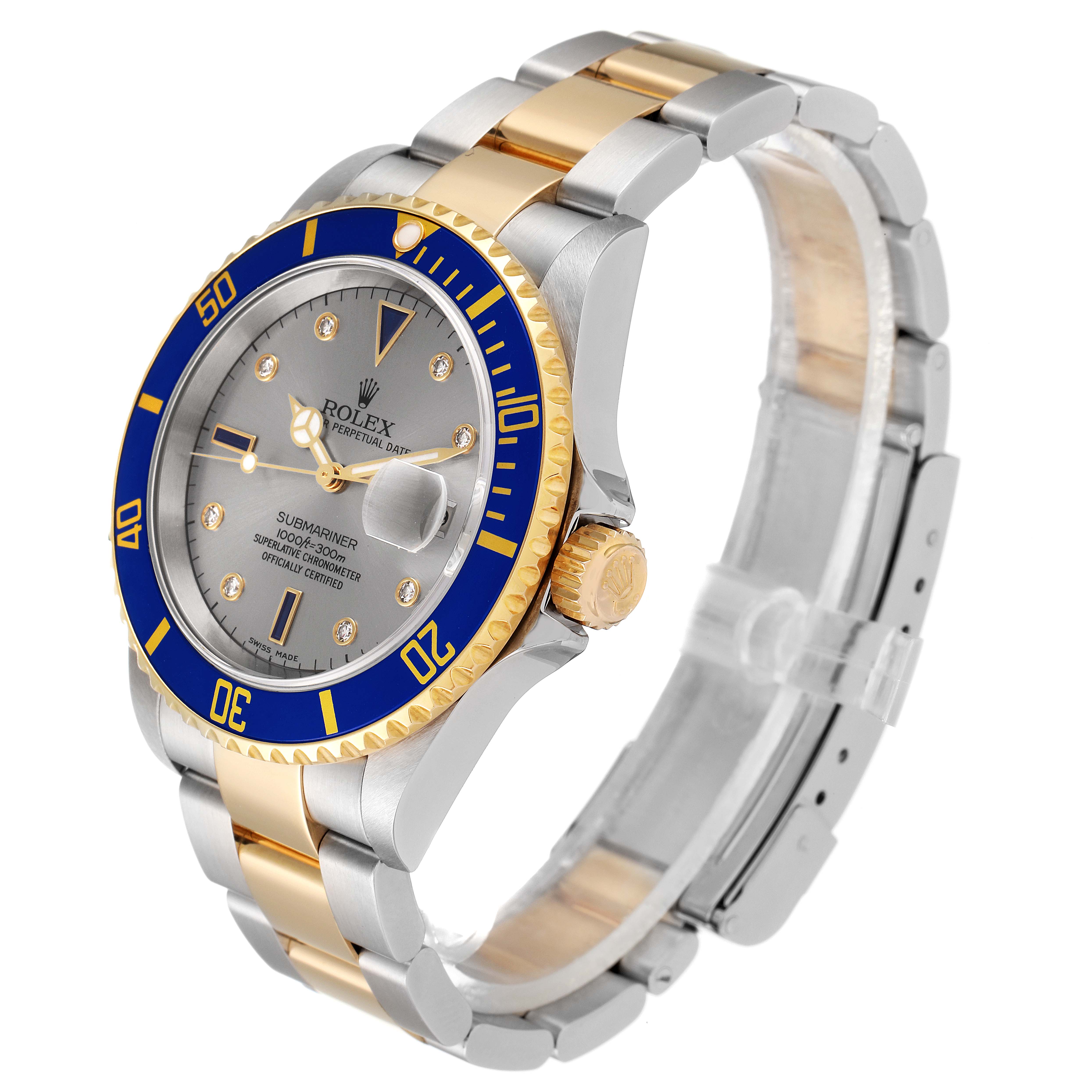 The Rolex Submariner 16613 Men
s Steel and Gold (two tone) Grey Dial 16613 Men
s Steel and Gold (two tone) Grey Dial watch is shown at an angled side view, highlighting the dial, bezel, and bracelet.
