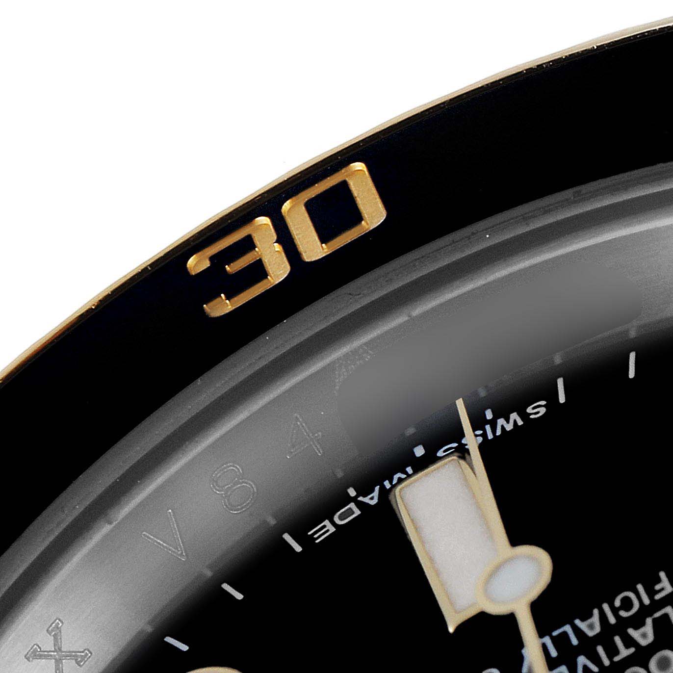 The image shows a close-up of the bezel and part of the dial of a Rolex Submariner 116613 Men's Steel and Gold (two tone) Black Dial 116613 Men's Steel and Gold (two tone) Black Dial, highlighting the "30" marker.