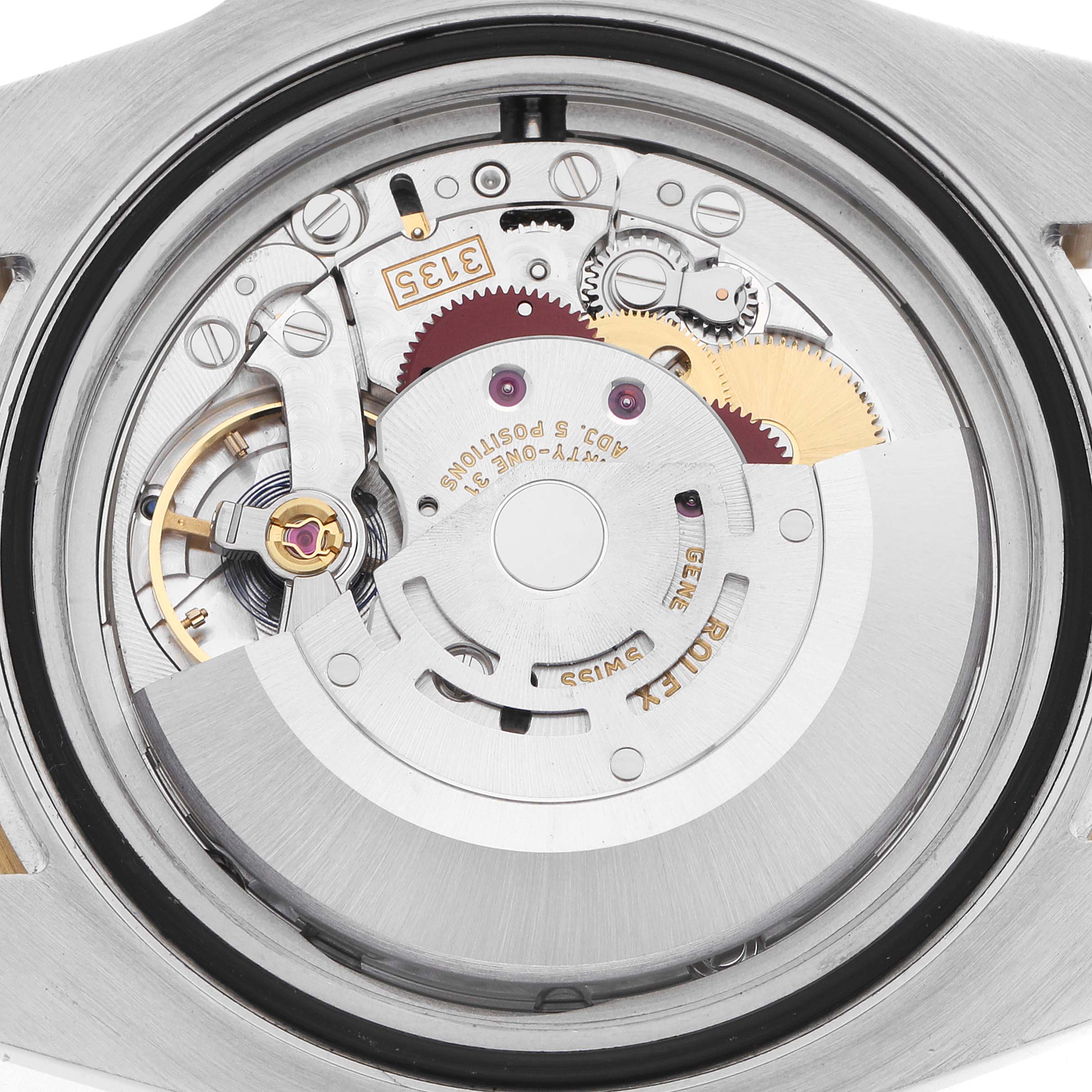 The image shows the internal movement and components of a Rolex Submariner 116613 Men
s Steel and Gold (two tone) Black Dial watch from a top-down angle.