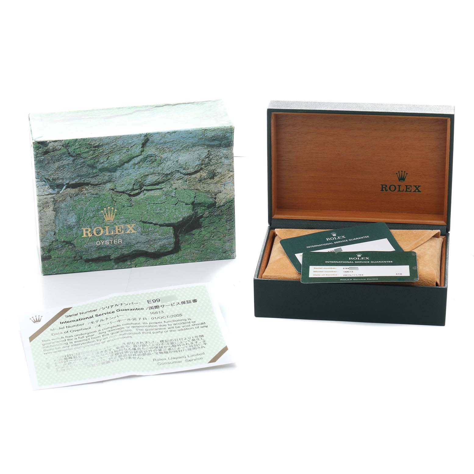 The image shows the packaging and documentation for a Rolex Submariner 16613 Men
s Steel and Gold (two tone) Champagne Dial watch, including the box, warranty cards, and service guarantee.