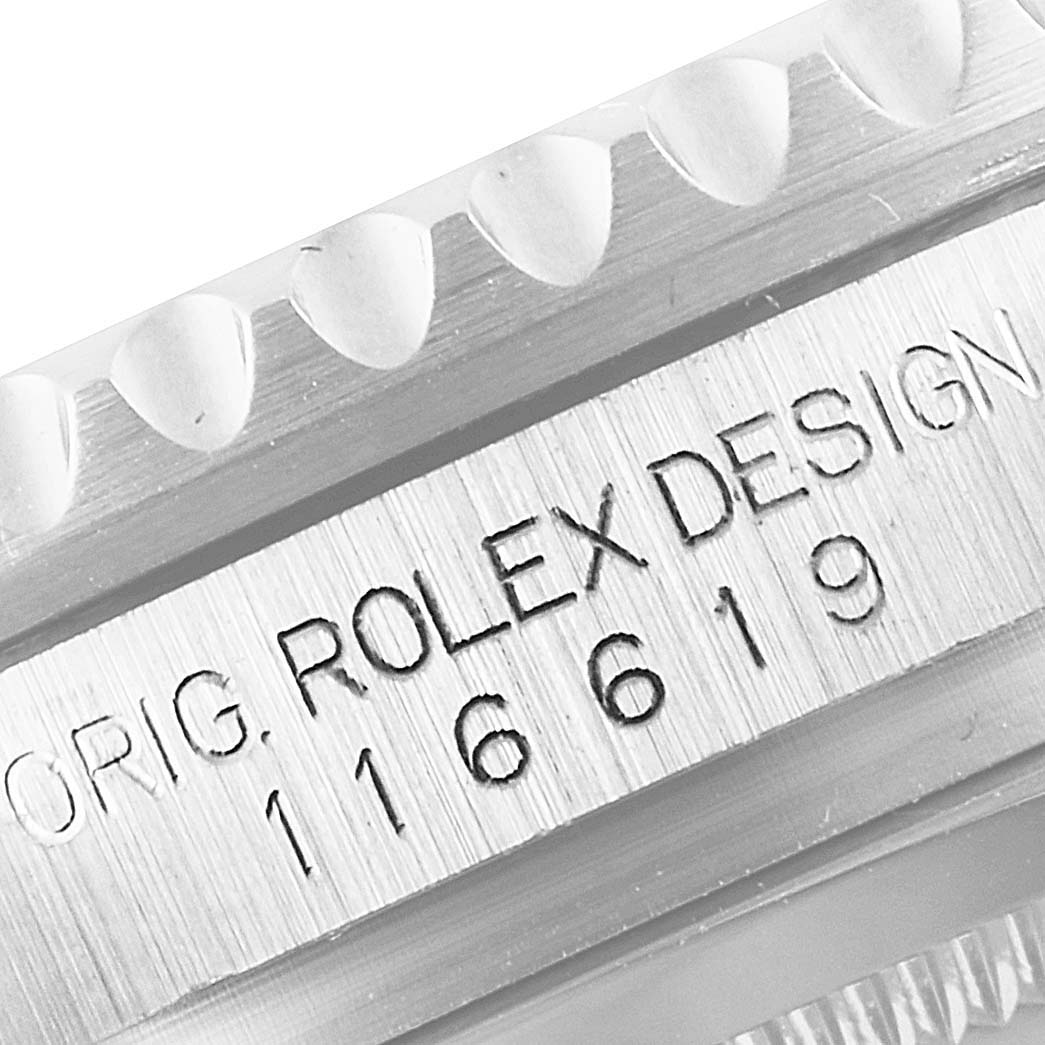 The image shows a close-up of the case side of a Rolex Submariner 116619 Men's White Gold Blue Dial 116619 Men's White Gold Blue Dial, displaying its model number and design engraving.
