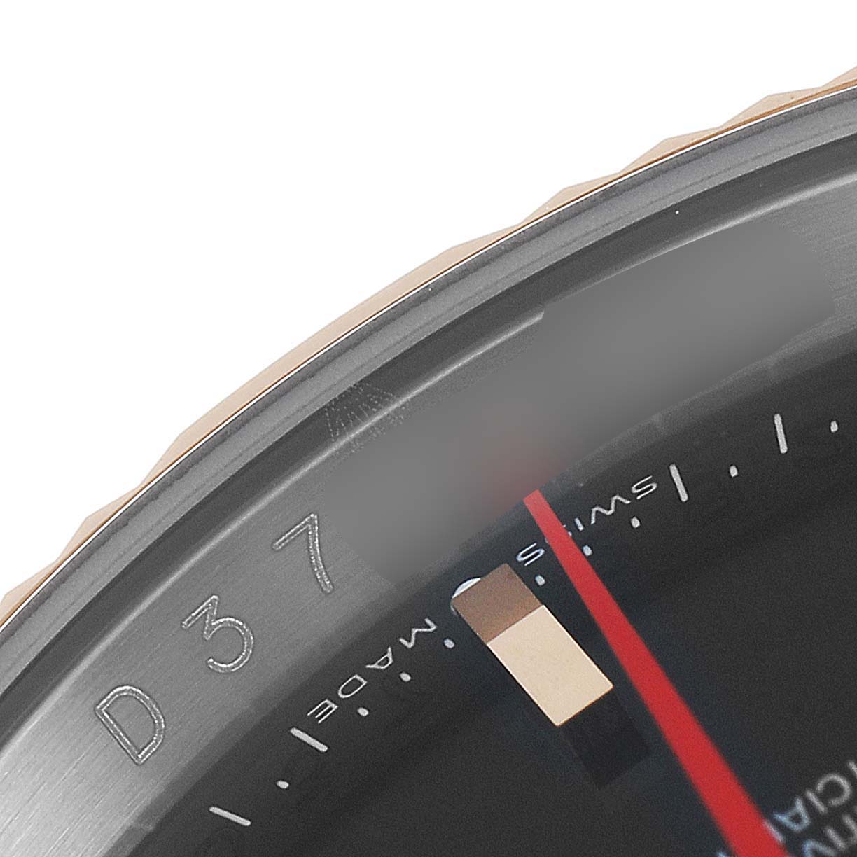 This image shows a close-up angle of the bezel and red second hand of a Rolex Turn-o-Graph 116261 Men
s Steel and Gold (two tone) Black Dial 116261 Men
s Steel and Gold (two tone) Black Dial watch.