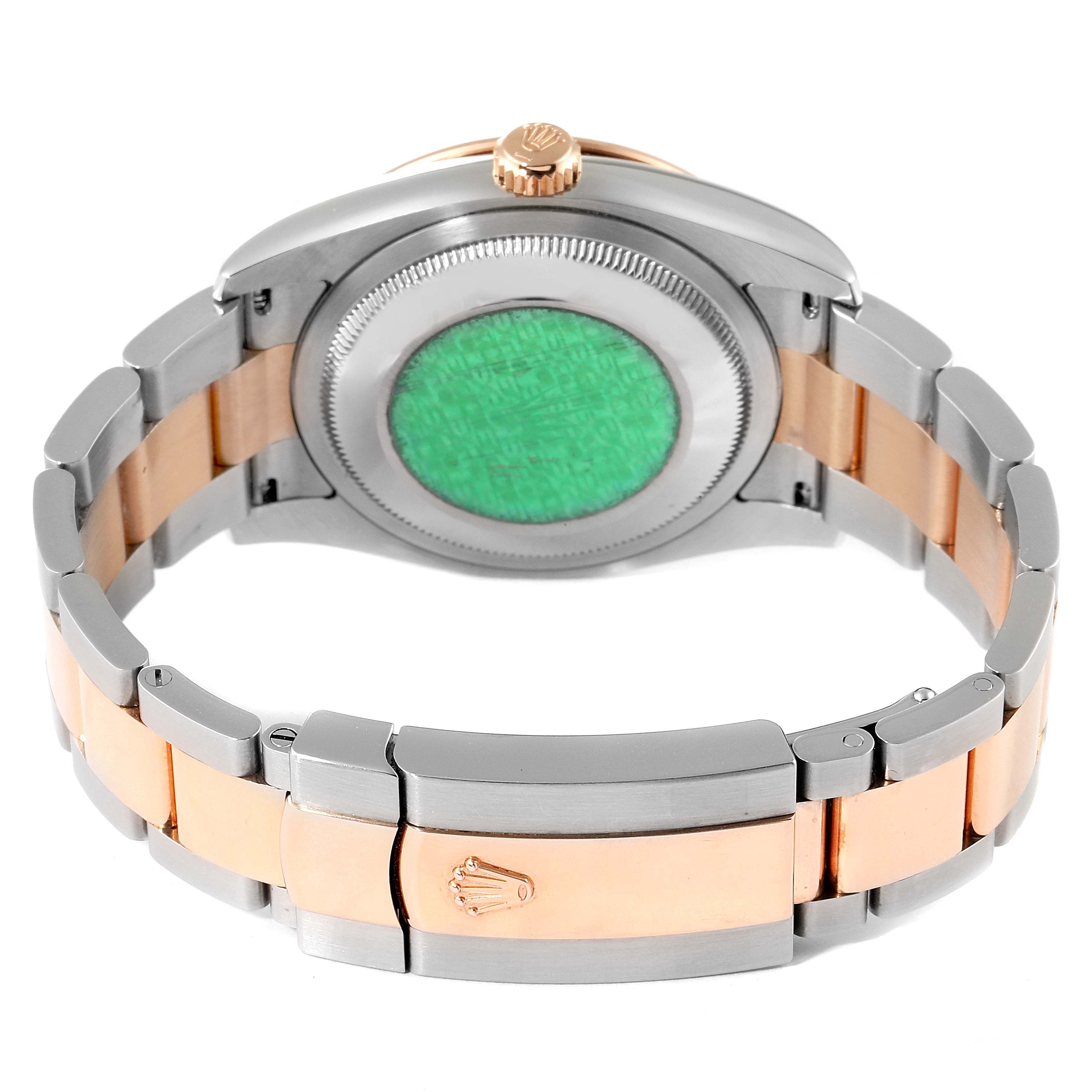 This image shows the back view of a Rolex Turn-o-Graph 116261 Men
s Steel and Gold (two tone) Black Dial 116261 Men
s Steel and Gold (two tone) Black Dial watch, highlighting the case back, crown, and two-tone bracelet.