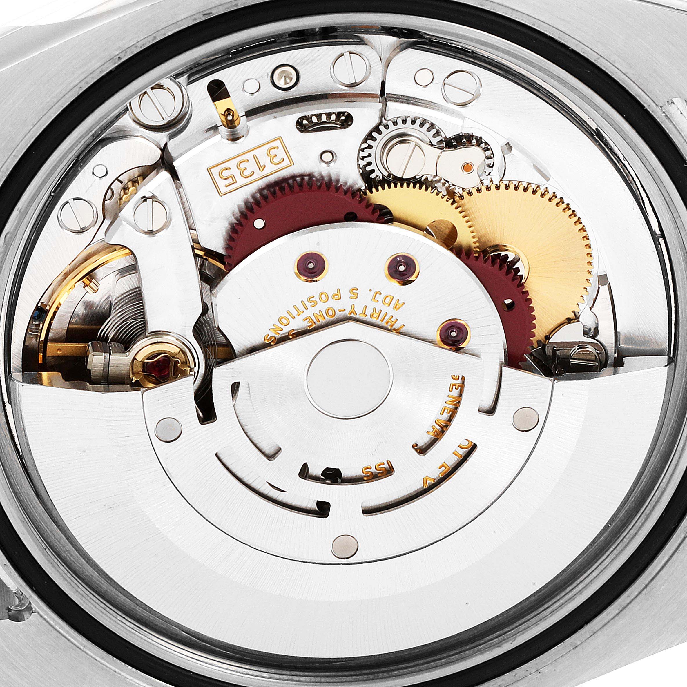 The image shows the intricate internal movement mechanism of a Rolex Turn-o-Graph 116261 Men
s Steel and Gold (two tone) Black Dial 116261 Men
s Steel and Gold (two tone) Black Dial watch, viewed from the back.