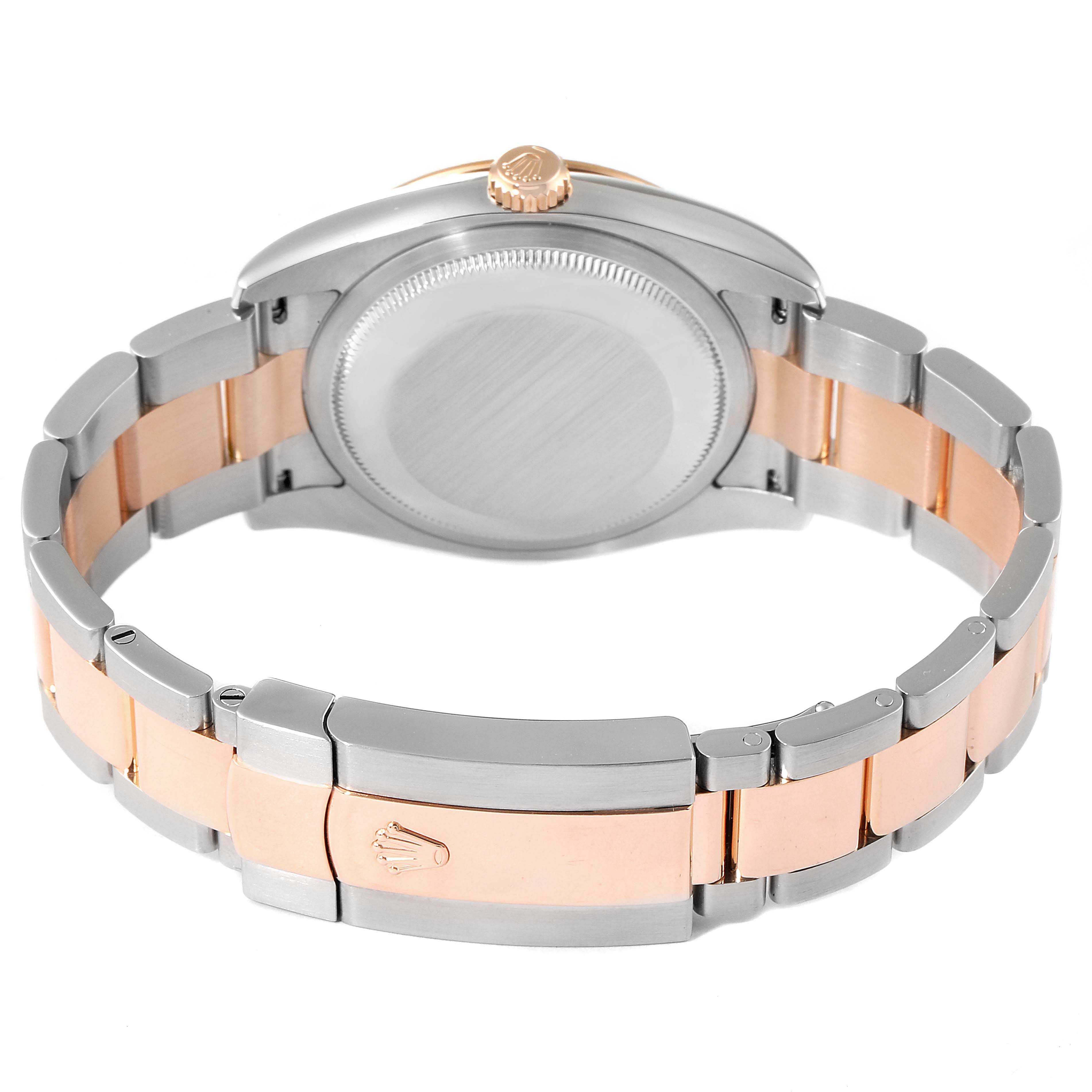 The image shows the back of the Rolex Turn-o-Graph 116261 Men's Steel and Gold (two tone) Silver Dial 116261 Men's Steel and Gold (two tone) Silver Dial watch, highlighting its case back, crown, and two-tone bracelet.