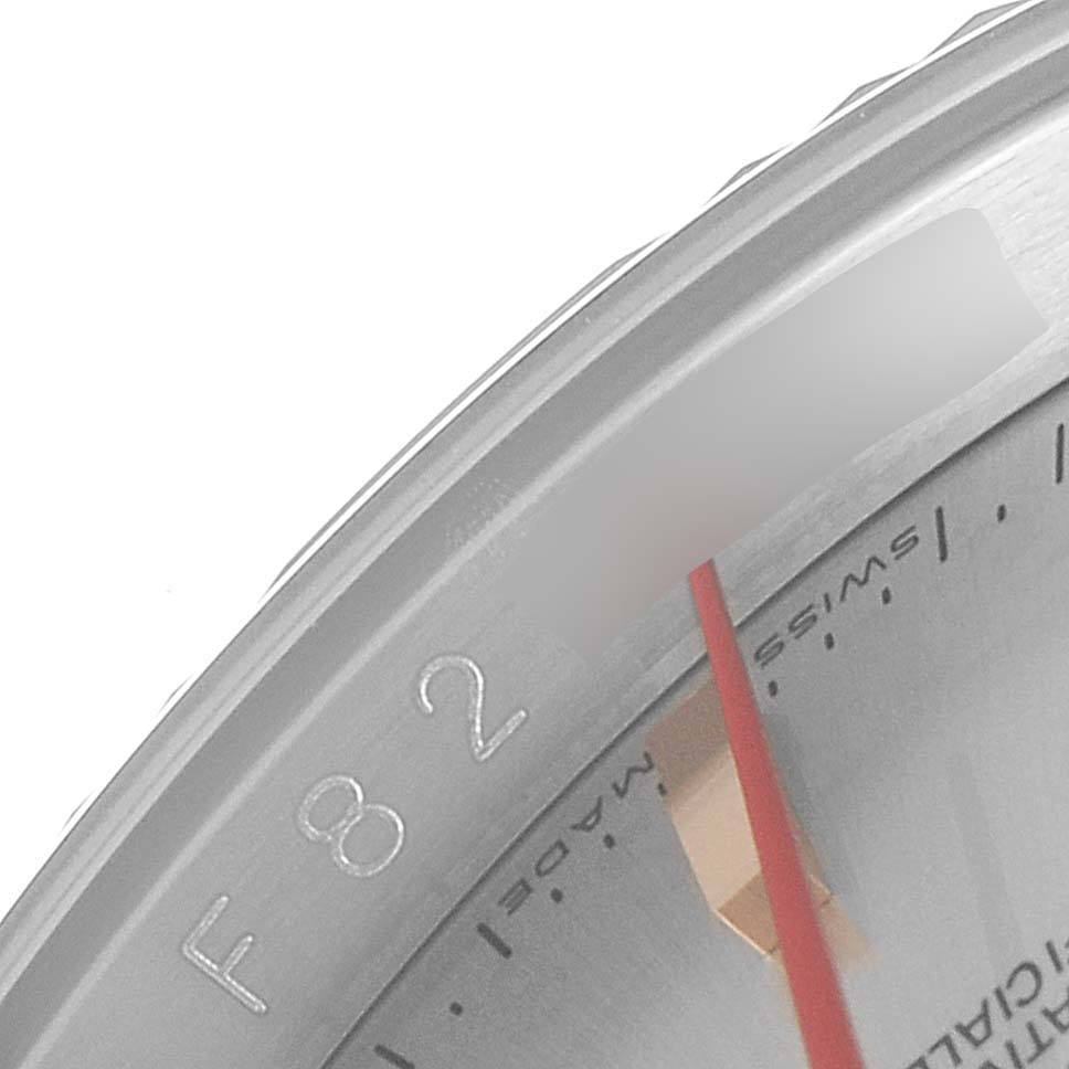 The image shows a close-up of the dial and bezel of a Rolex Turn-o-Graph 116261 Men's Steel and Gold (two tone) Silver Dial 116261 Men's Steel and Gold (two tone) Silver Dial watch, highlighting the "Swiss," numerals, and second hand.