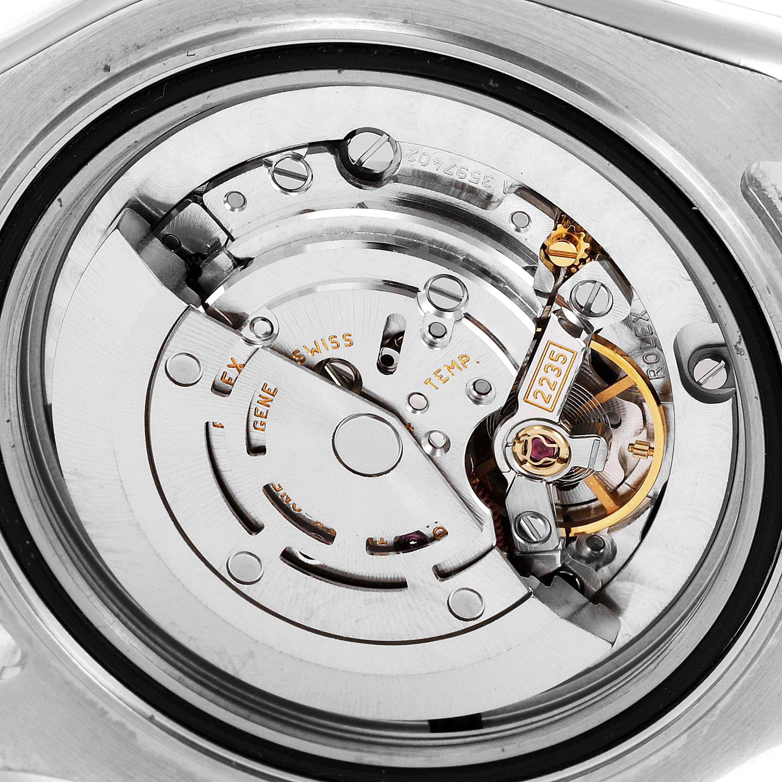 This is an inside view of the Rolex Yacht-Master 168623 Men's Steel and Gold (two tone) Grey Dial 168623 Men's Steel and Gold (two tone) Grey Dial watch, showcasing its mechanical movement and intricate components.