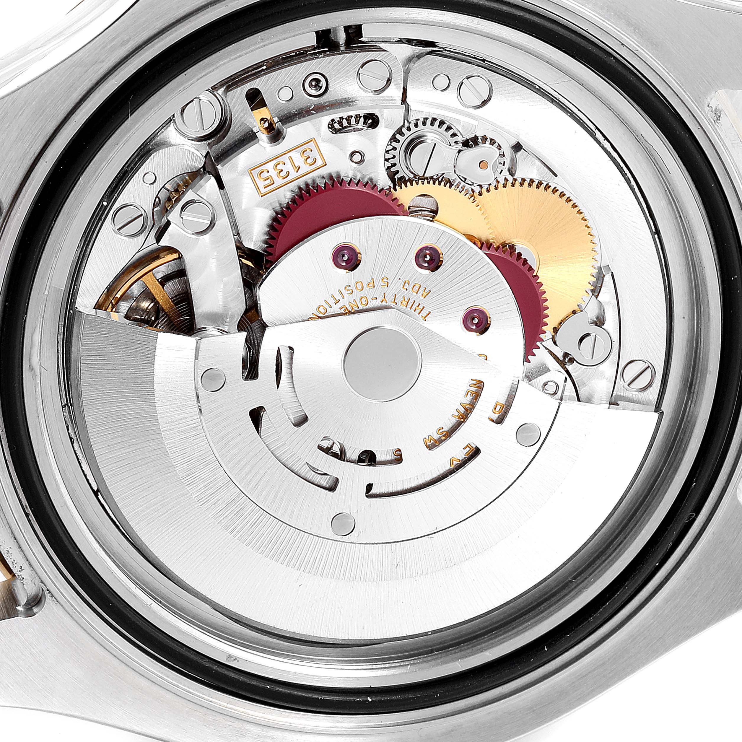This image shows the internal mechanism of a Rolex Yacht-Master 16623 Men's Steel and Gold (two tone) Mother of Pearl Dial 16623 Men's Steel and Gold (two tone) Mother of Pearl Dial watch from a back angle, highlighting gears and movements.