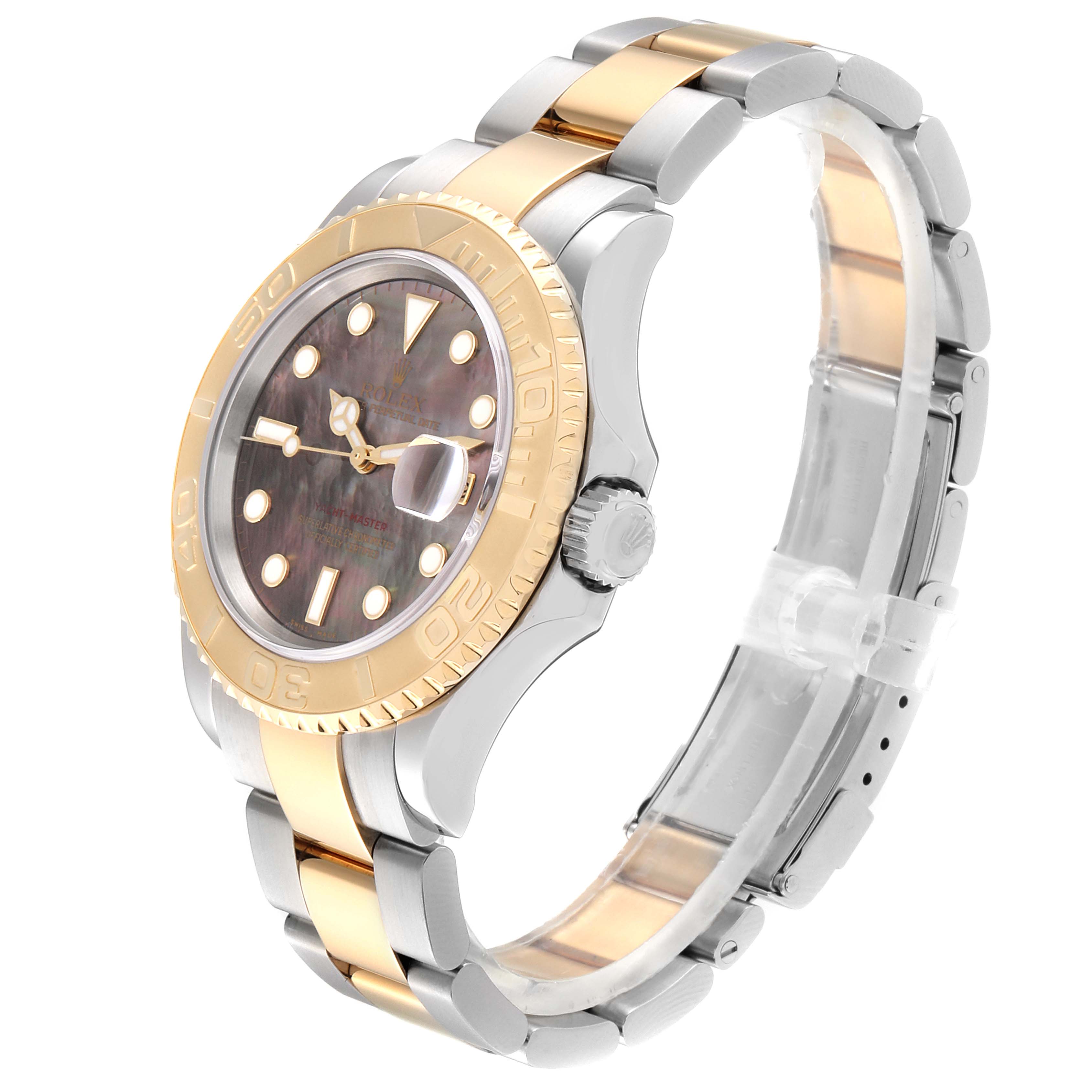 The Rolex Yacht-Master 16623 Men's Steel and Gold (two tone) Mother of Pearl Dial 16623 Men's Steel and Gold (two tone) Mother of Pearl Dial watch is shown at an oblique angle, highlighting its face, bezel, crown, and two-tone bracelet.