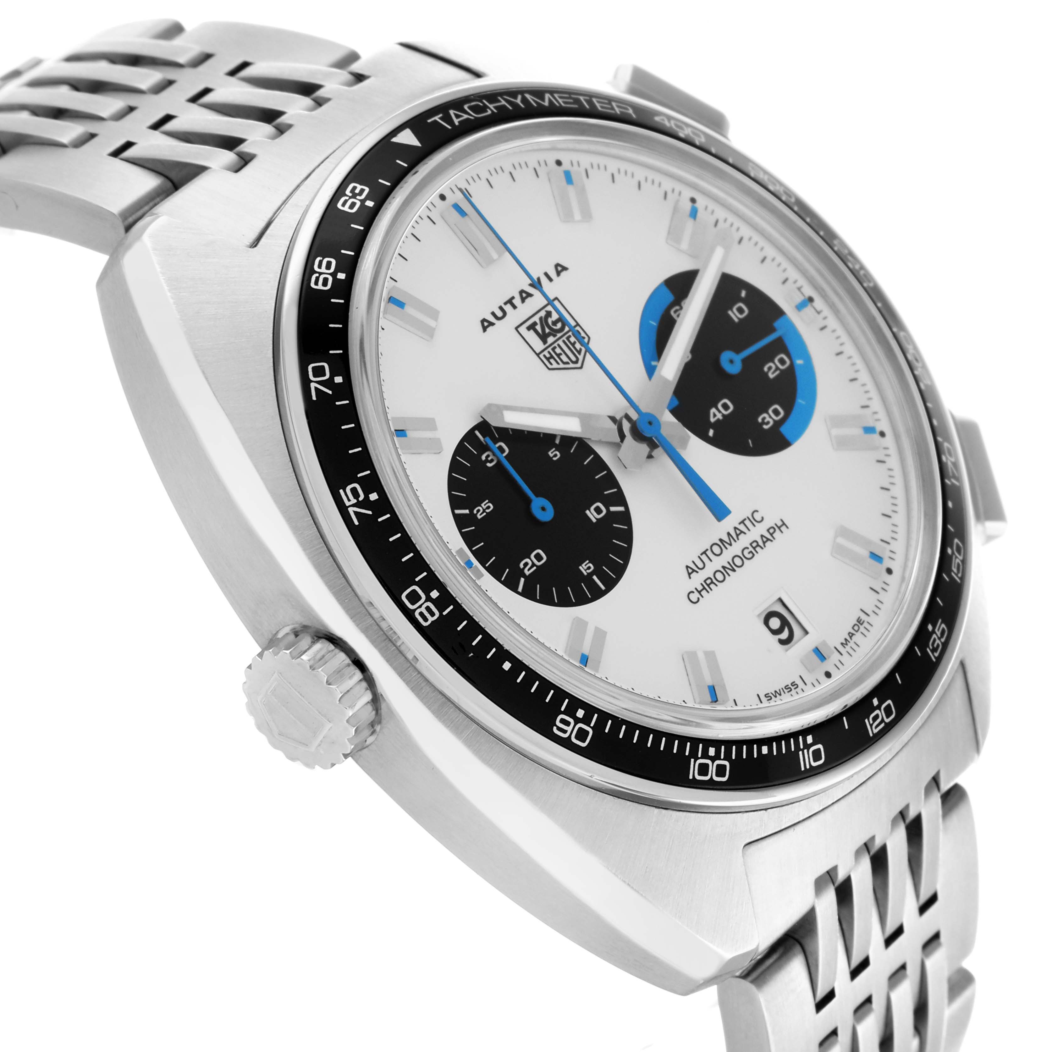 The Tag Heuer Autavia CY2110 Men
s Stainless Steel White Dial watch is shown at a slight angle, highlighting the face, tachymeter bezel, crown, and stainless steel bracelet.
