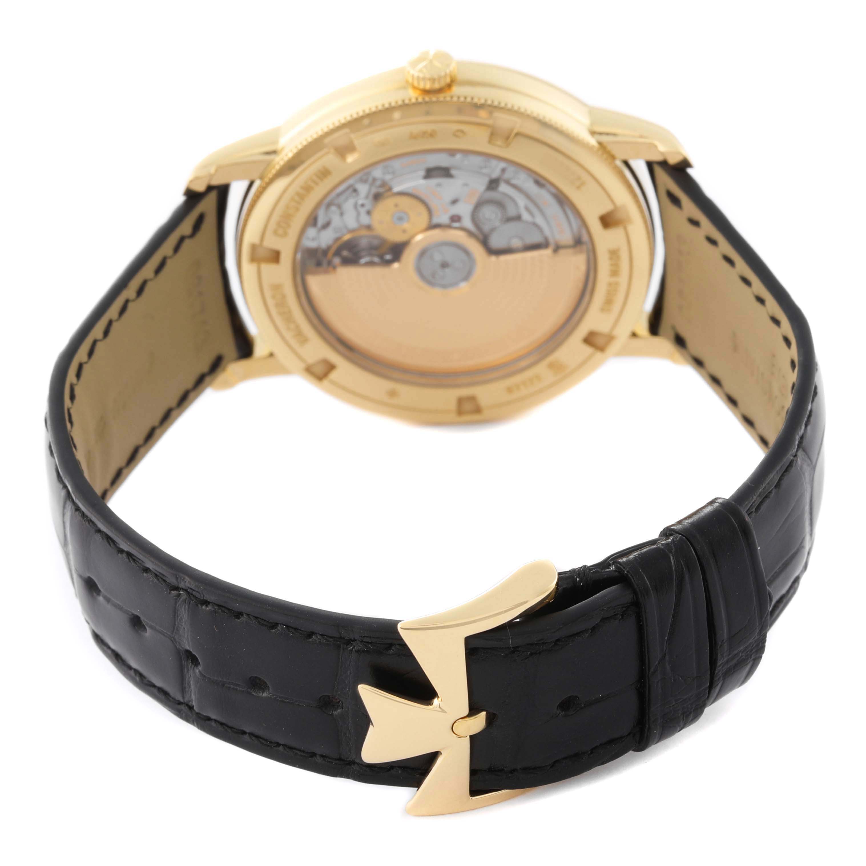 The image shows the back of the Vacheron Constantin Traditionnelle 87172/000J Men's Yellow Gold Silver Dial 87172/000J Men's Yellow Gold Silver Dial watch, highlighting its movement and strap buckle.