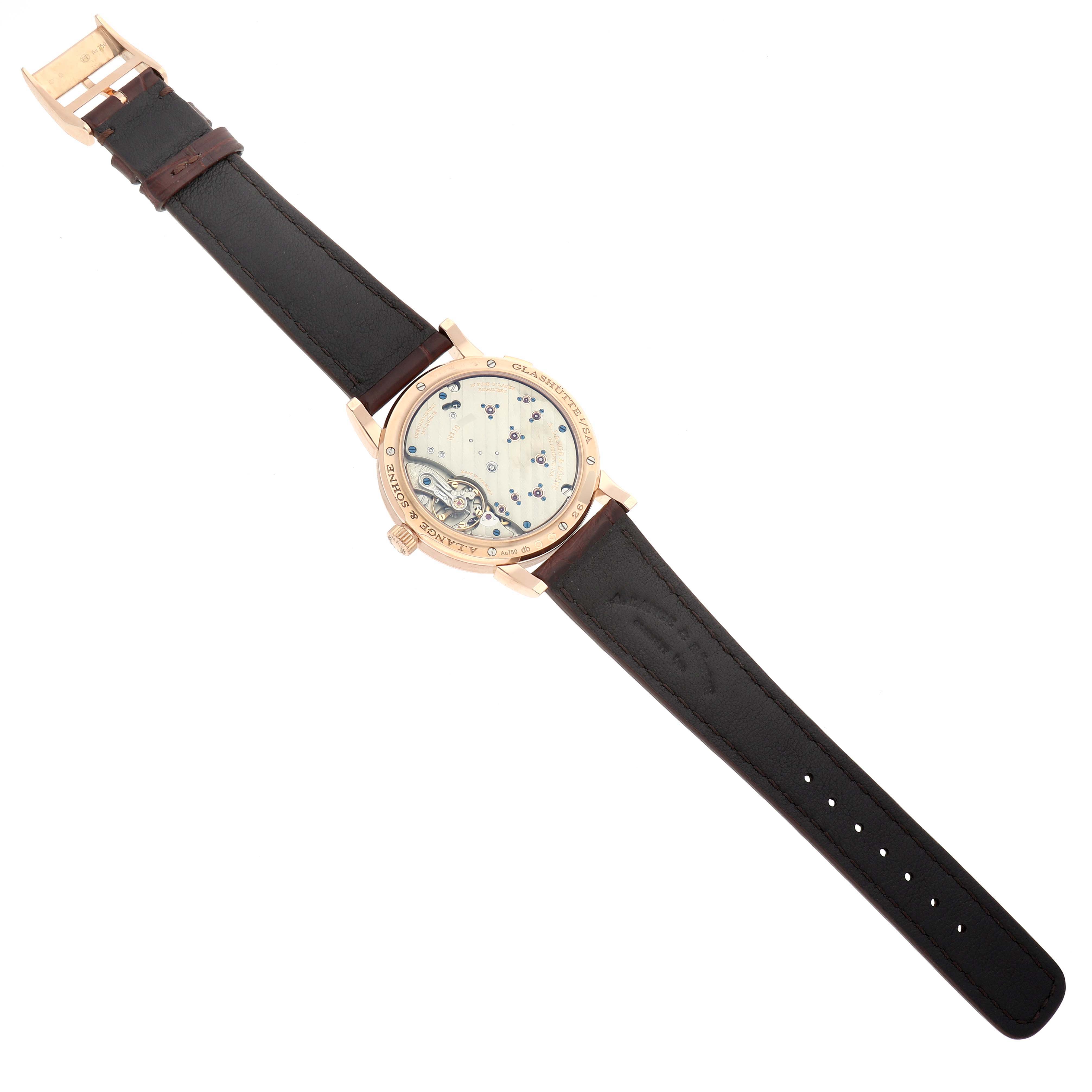 The A. Lange 
Sohne Lange 1 191.032 Men
s Rose Gold Silver Dial watch is displayed from the back, showcasing the movement and the leather strap.