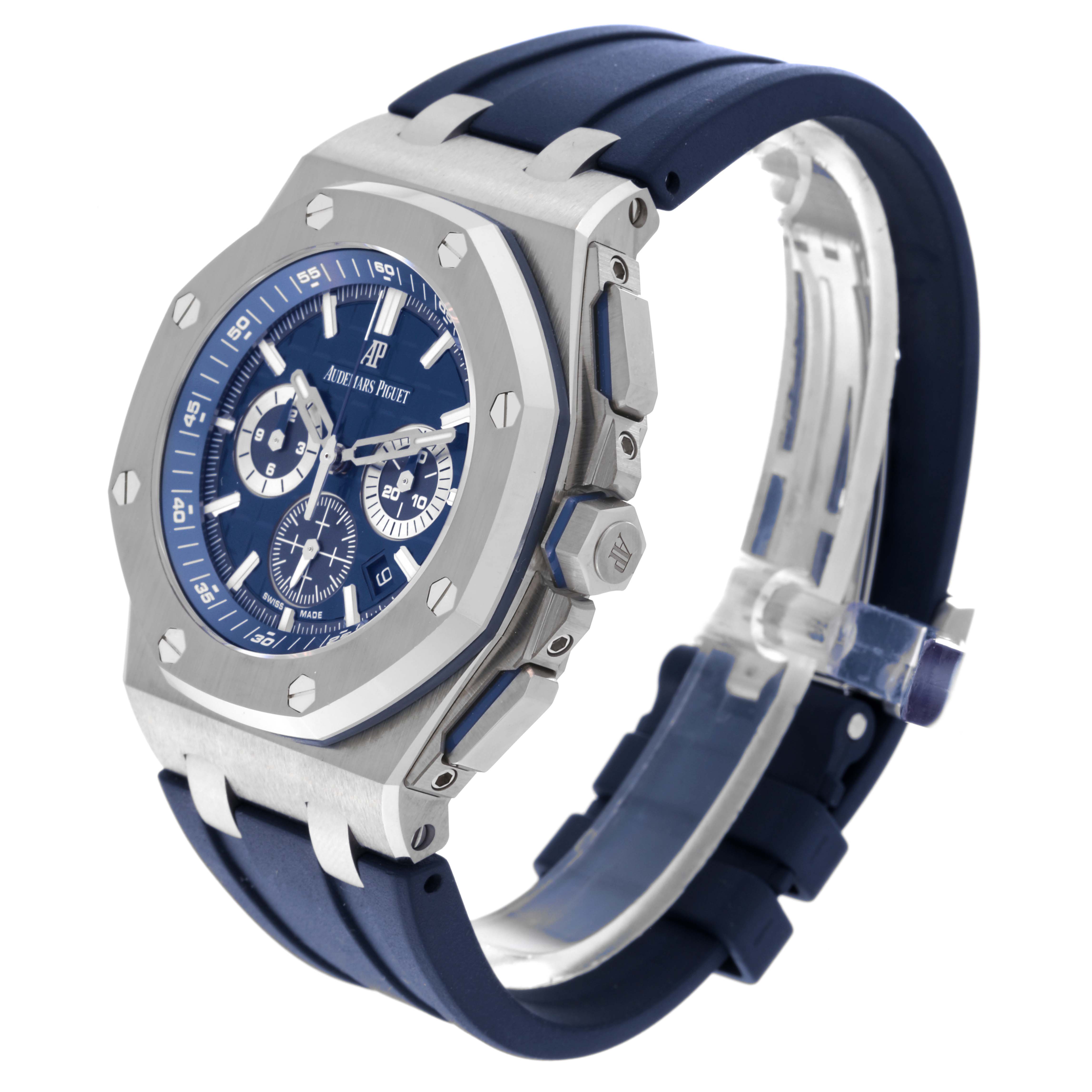 This image shows a side-angle view of an Audemars Piguet Royal Oak 26480TI.OO.A027CA.01 Men's Titanium Blue Dial 26480TI.OO.A027CA.01 Men's Titanium Blue Dial watch, featuring its bezel, dial, and rubber strap.