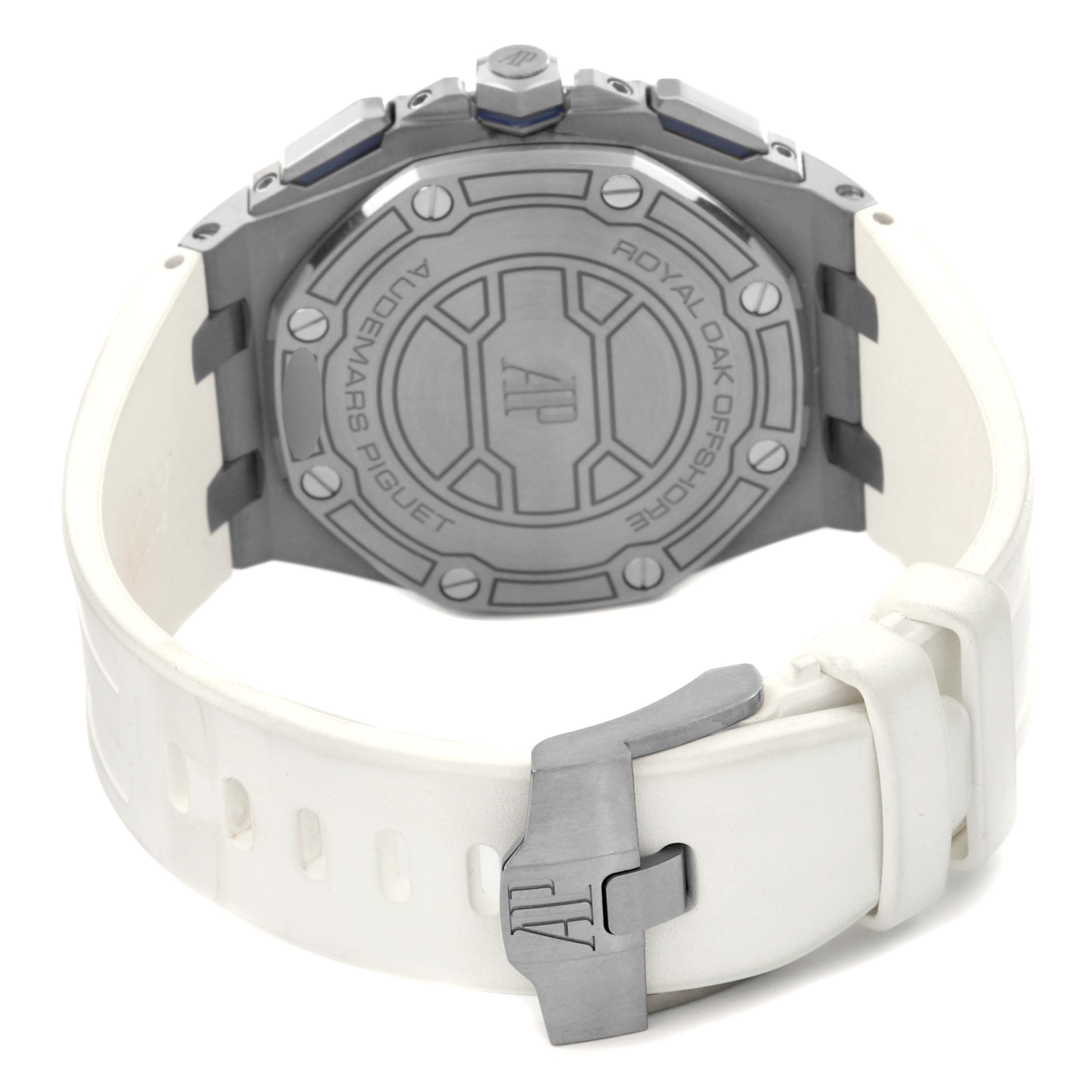 The back view of a Royal Oak Offshore by Audemars Piguet shows the case back, clasp, and white rubber strap.