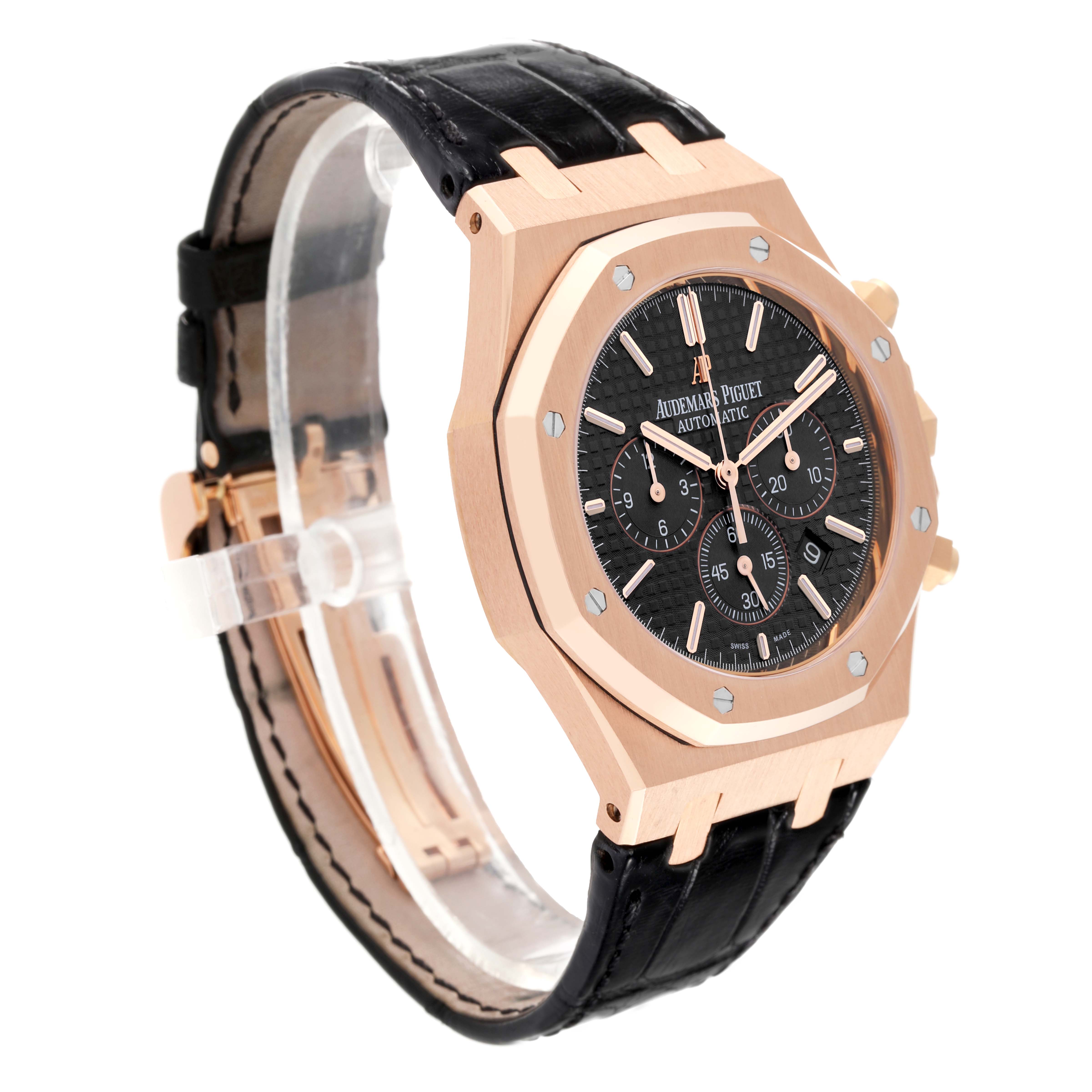 The image shows an angled view of an Audemars Piguet Royal Oak 26320OR.OO.D002CR.01 Men's Rose Gold Black Dial 26320OR.OO.D002CR.01 Men's Rose Gold Black Dial model with a rose gold case, black dial, and black leather strap.