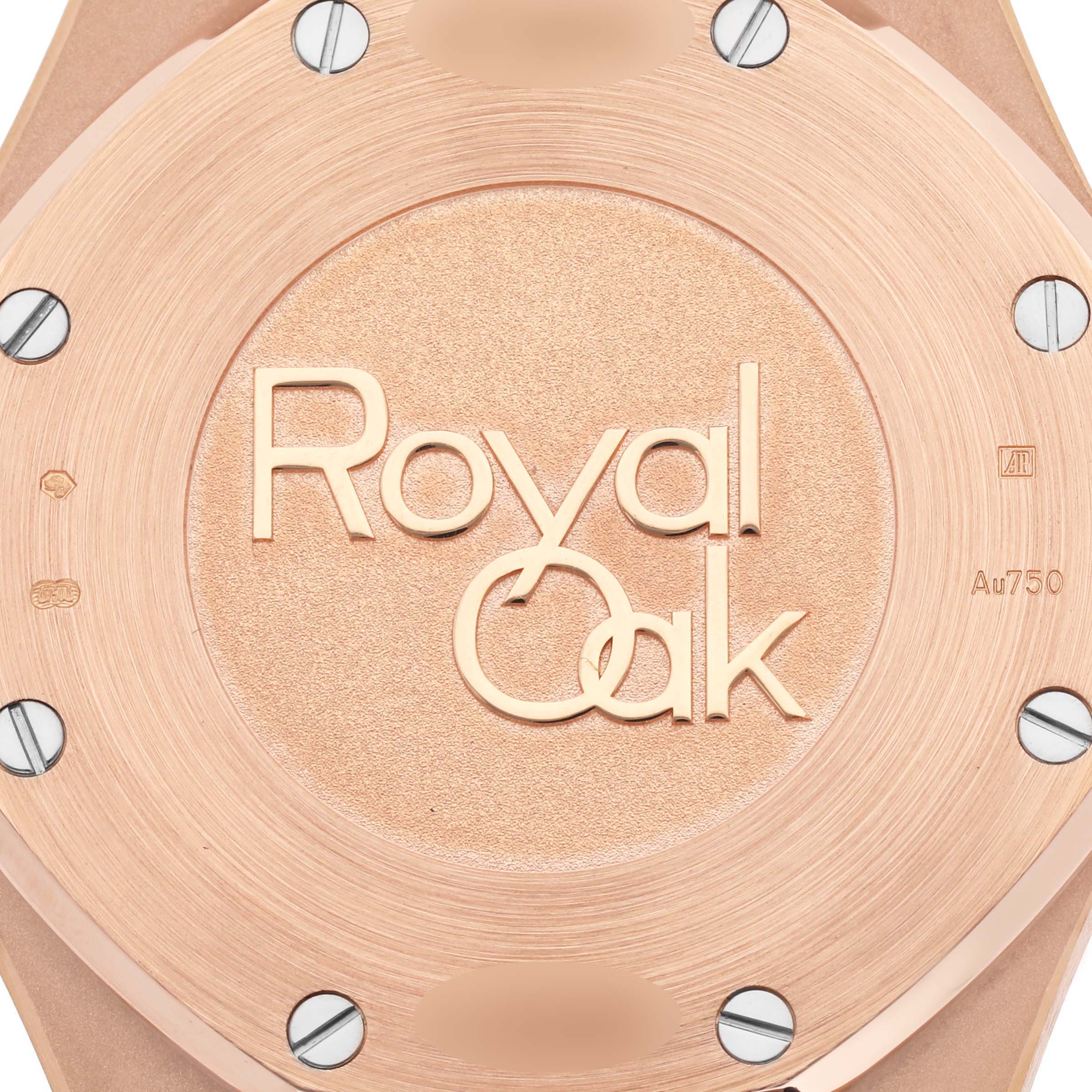 This image shows a close-up of the case back of the Audemars Piguet Royal Oak 26320OR.OO.D002CR.01 Men's Rose Gold Black Dial 26320OR.OO.D002CR.01 Men's Rose Gold Black Dial model, featuring the "Royal Oak" engraving and visible screws.