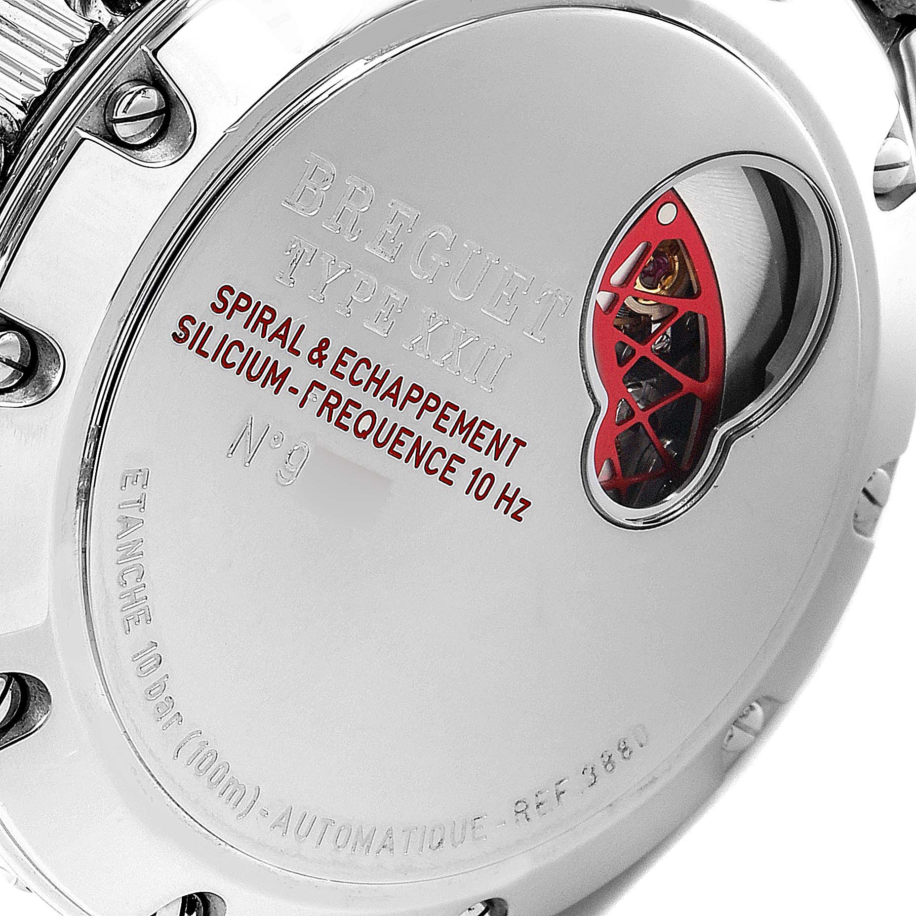 This image shows the back of a Breguet Type XXI watch, highlighting the spiral and escapement mechanism through a transparent aperture.