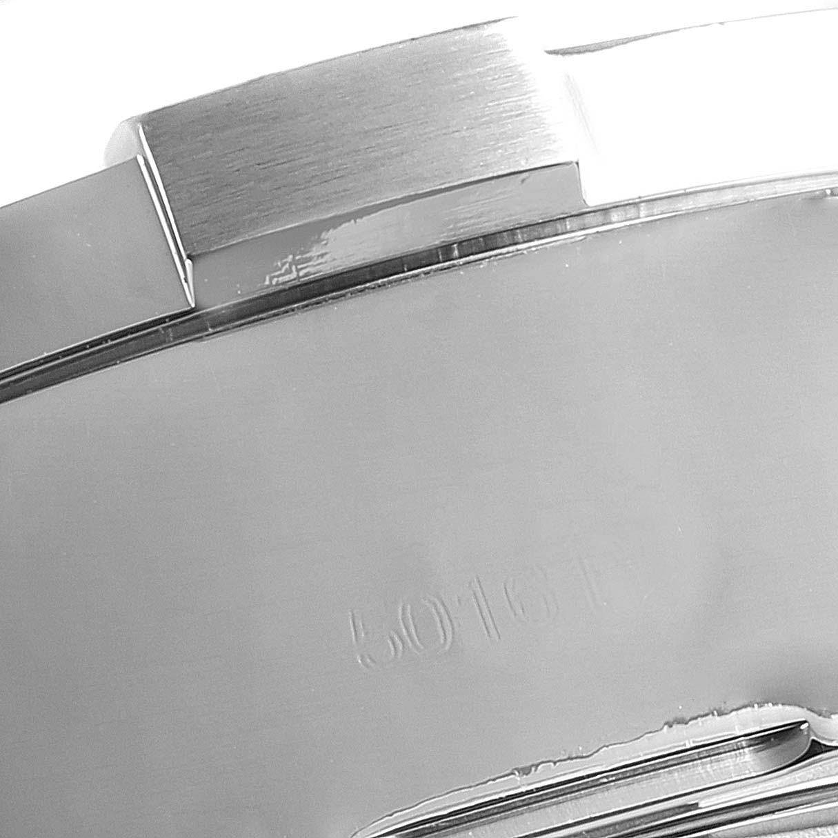 The image shows a close-up of the case back and bezel edge of a Breitling Avenger A13371 Men's Stainless Steel Blue Dial A13371 Men's Stainless Steel Blue Dial watch.