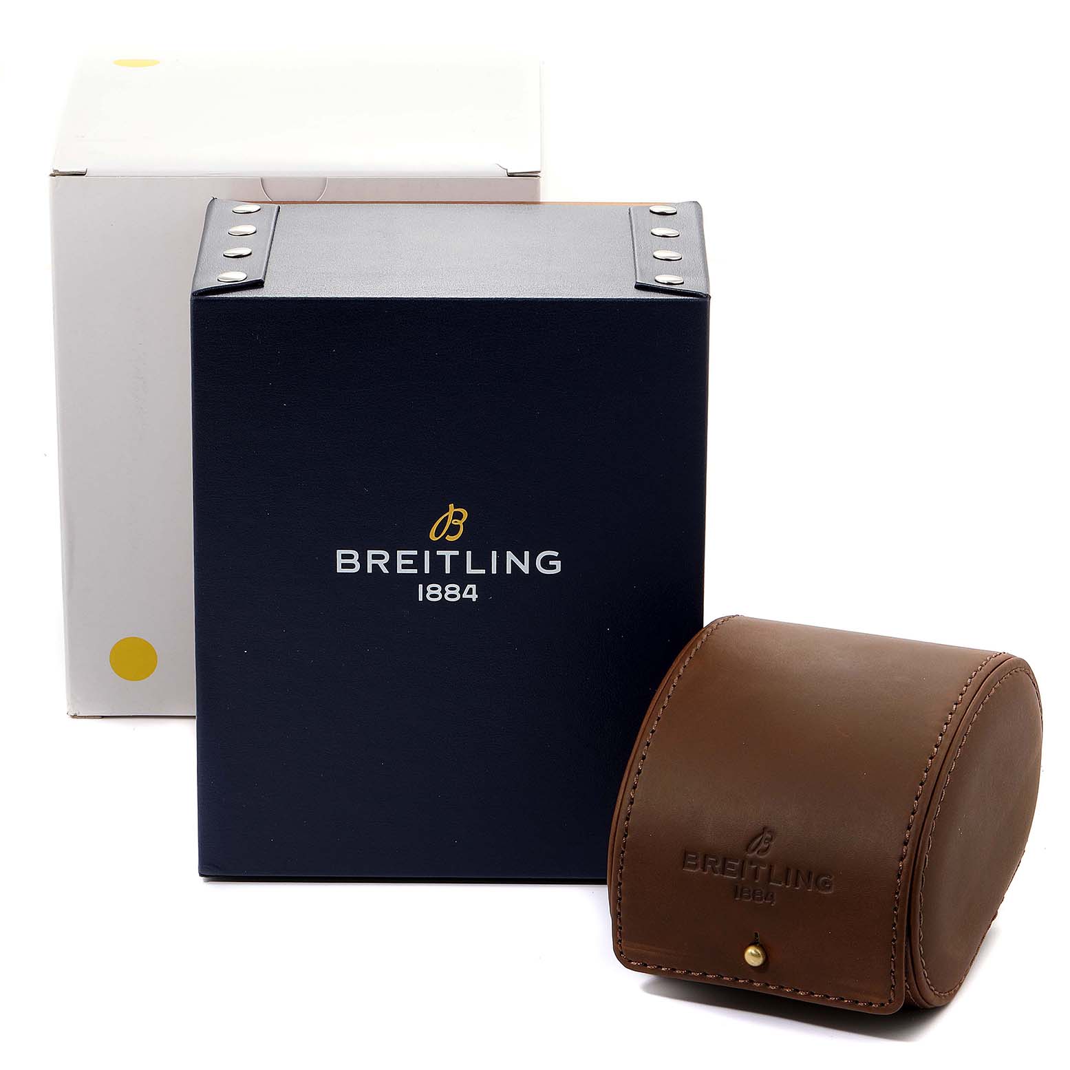 This image shows the packaging for a Breitling Superocean A13340 Men's Stainless Steel Beige Dial A13340 Men's Stainless Steel Beige Dial watch including a white box, a blue box, and a brown leather case.