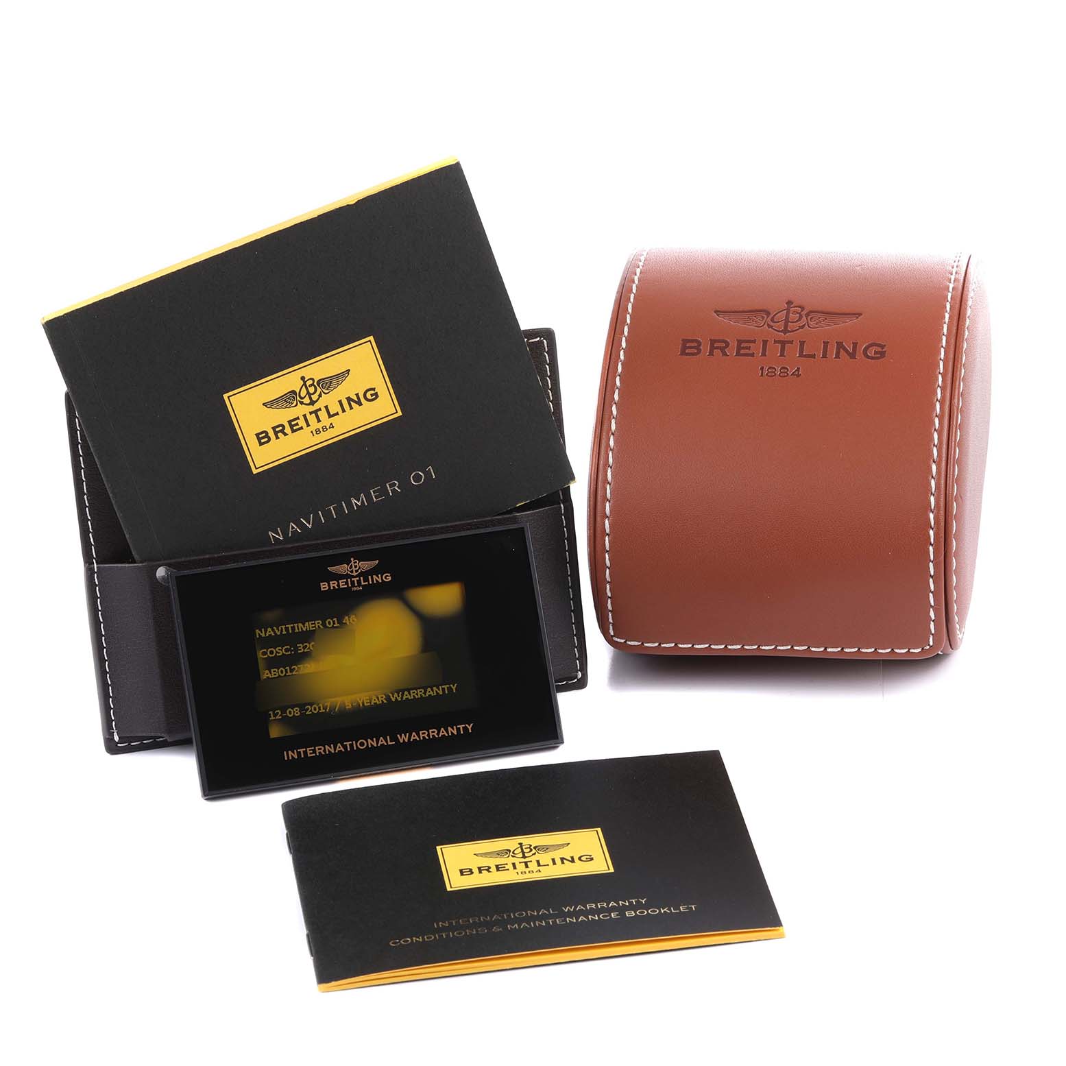 The image shows the Breitling Navitimer AB012721-C889-453A Men's Stainless Steel Blue Dial AB012721-C889-453A Men's Stainless Steel Blue Dial watch's leather case, manuals, and international warranty card from a front angle.