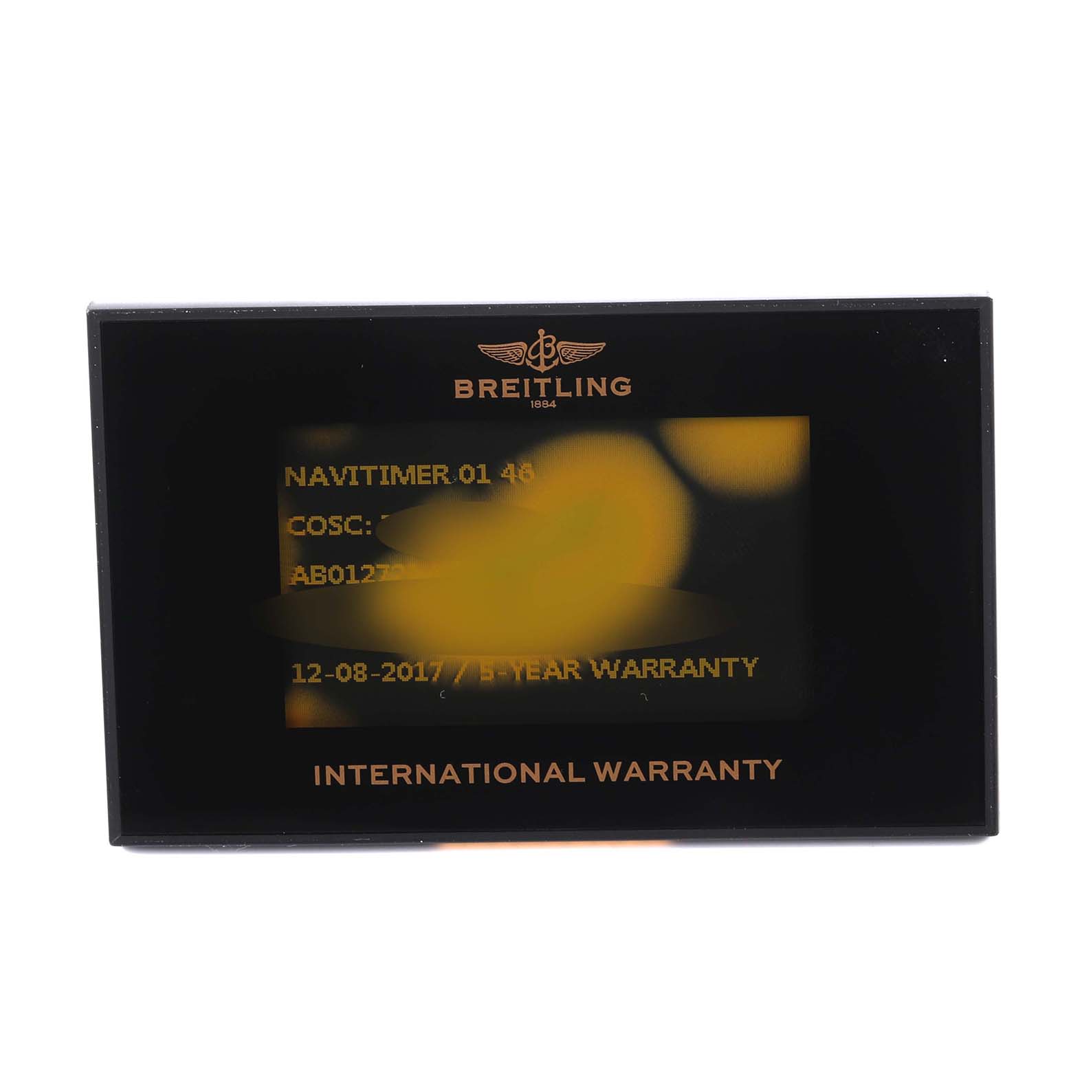This image shows an international warranty card for the Breitling Navitimer AB012721-C889-453A Men's Stainless Steel Blue Dial AB012721-C889-453A Men's Stainless Steel Blue Dial model watch, viewed from the front.
