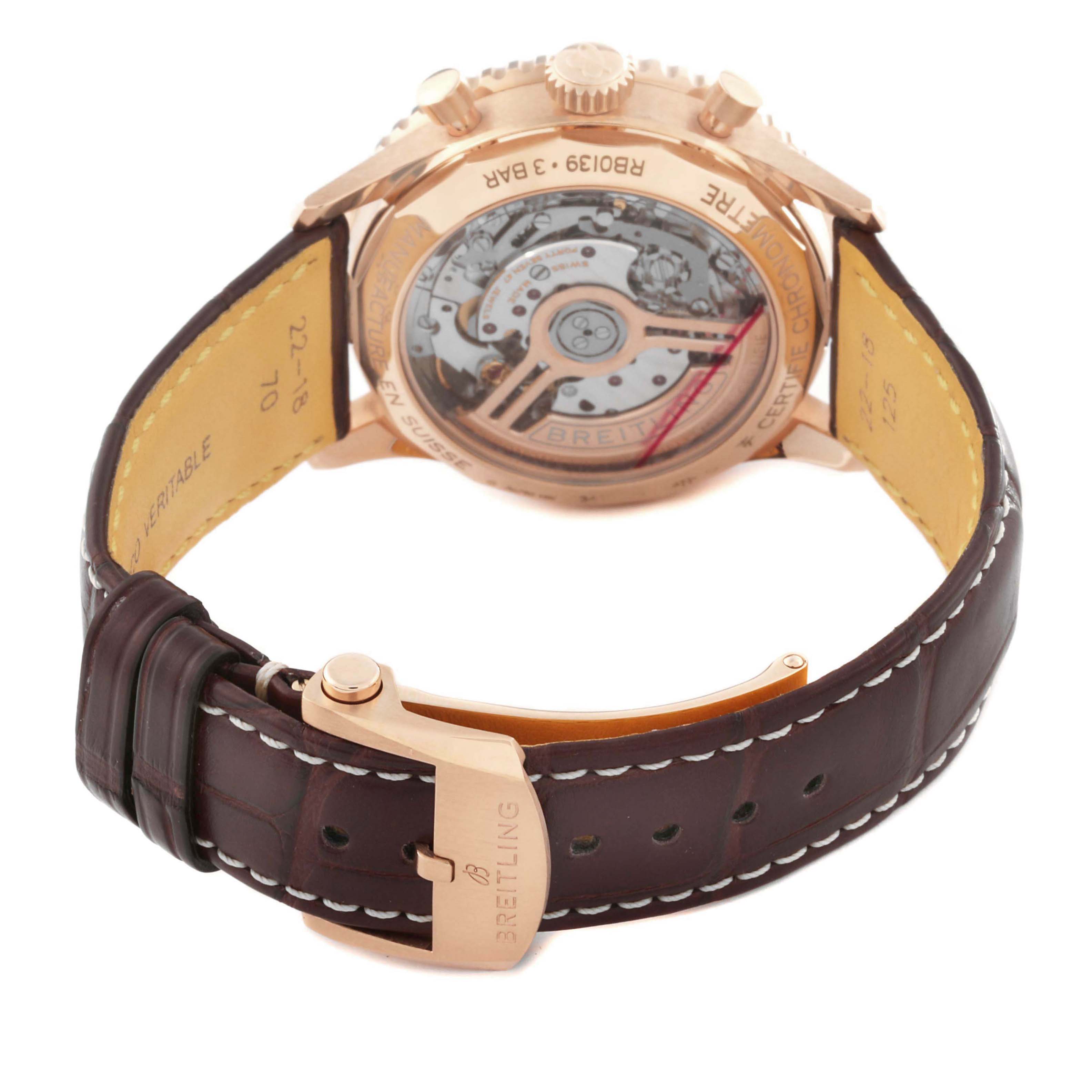 The image shows the back and side of the Breitling Navitimer RB0139 Men's Rose Gold Silver Dial, highlighting the case back and leather strap with clasp.
