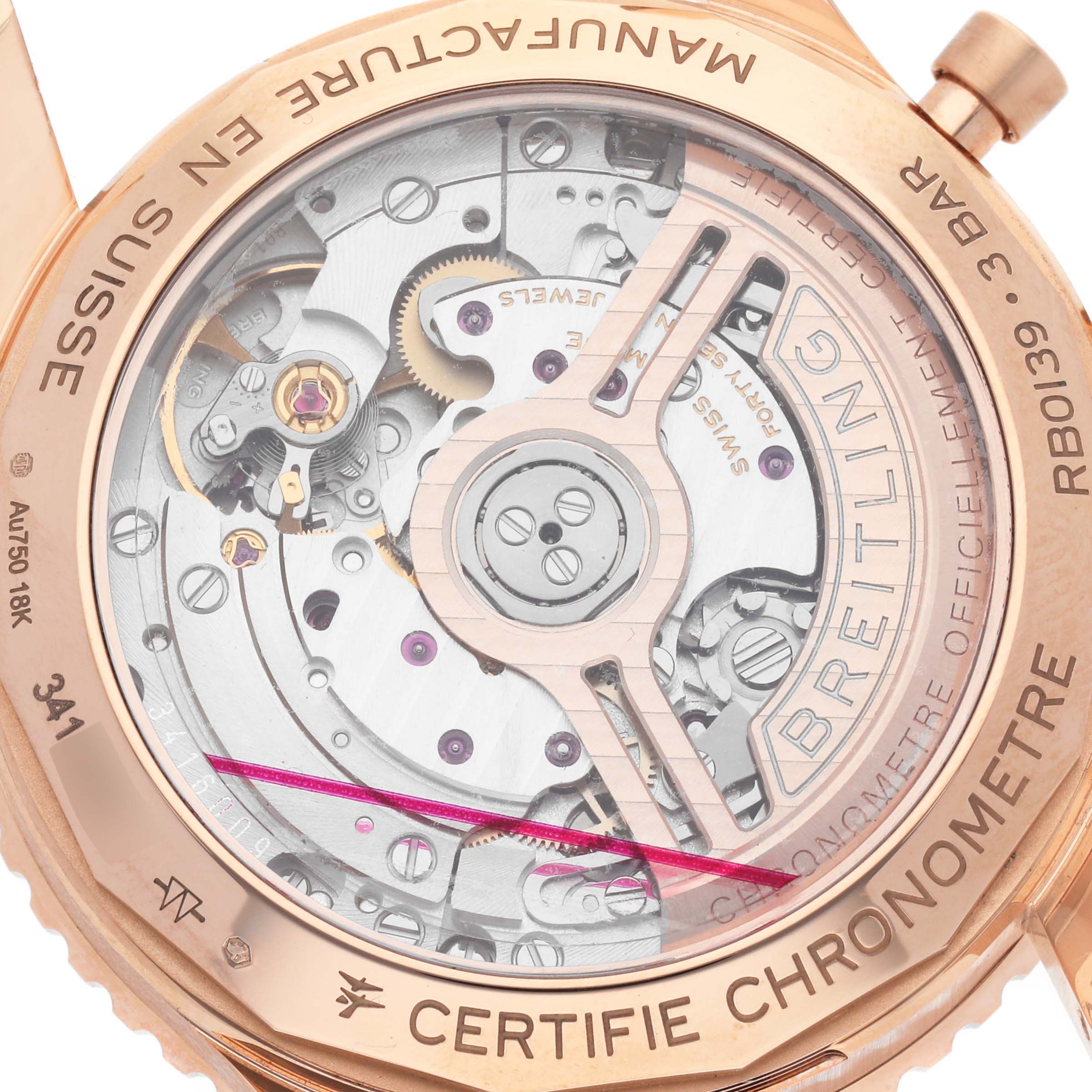 This is the case back view of the Breitling Navitimer RB0139 Men's Rose Gold Silver Dial RB0139 Men's Rose Gold Silver Dial watch, showcasing its internal mechanical movement and components.