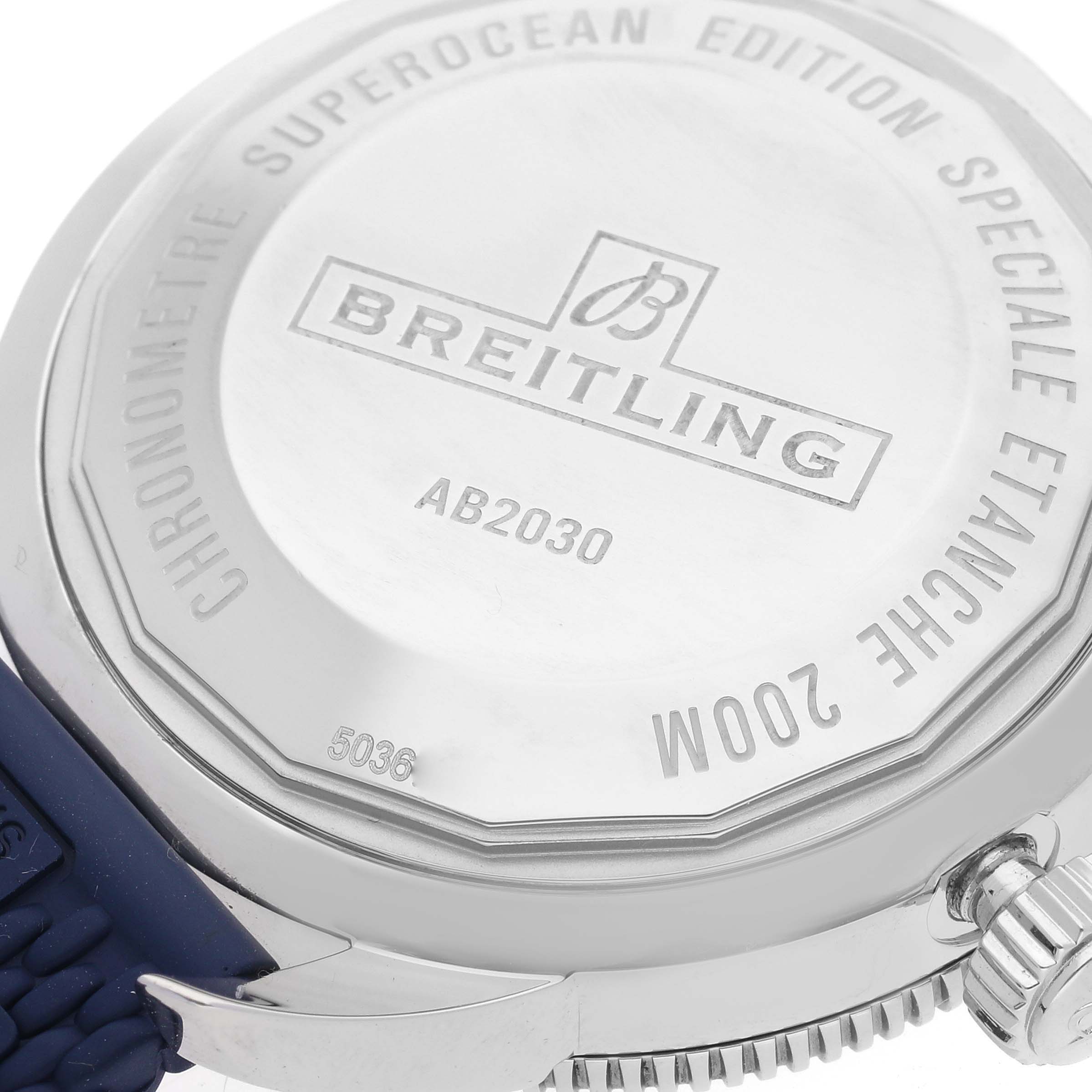 This image shows the case back and part of the crown of the Breitling Superocean AB2030 Men's Stainless Steel Blue Dial AB2030 Men's Stainless Steel Blue Dial model, highlighting its engravings.