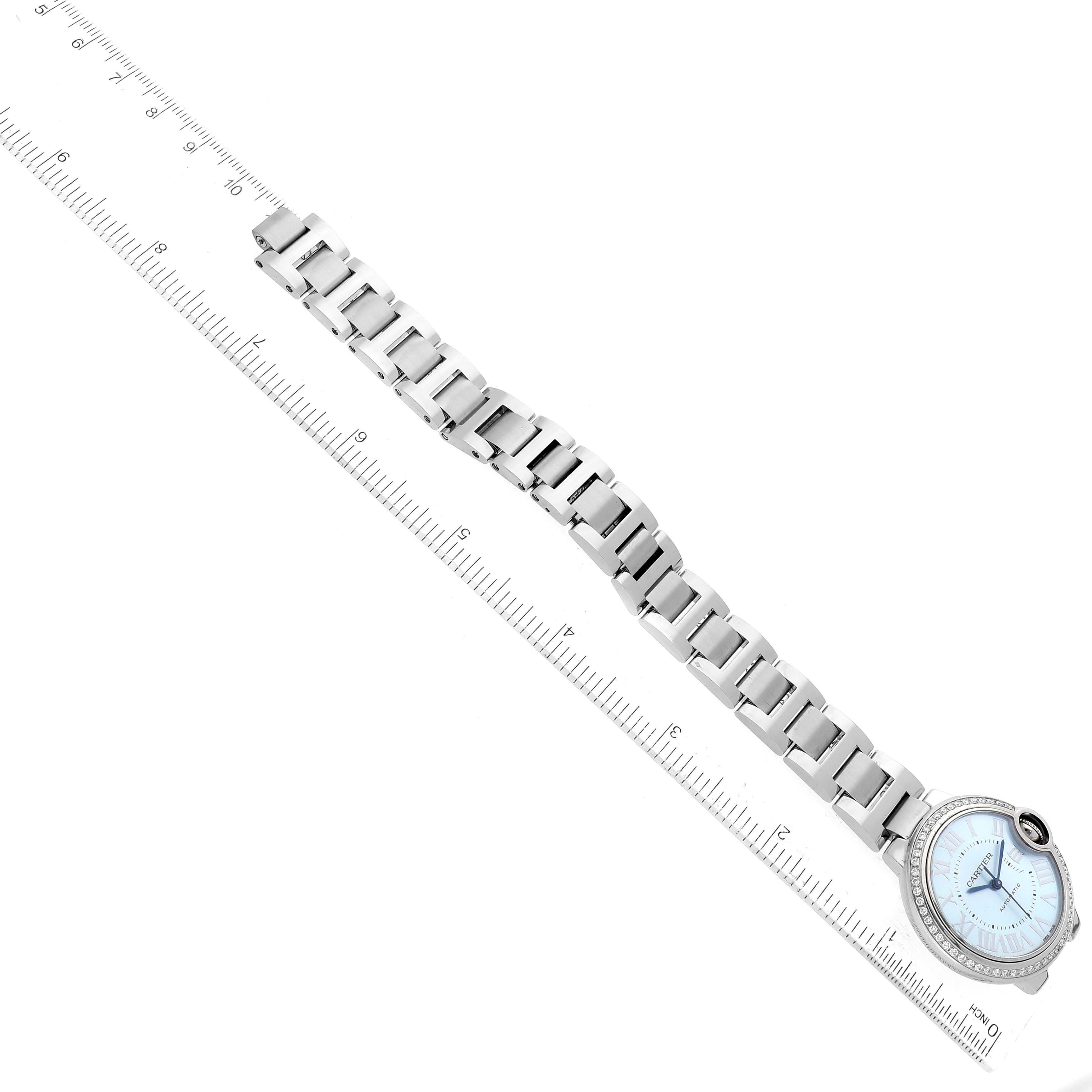 This image shows the Ballon Bleu model by Cartier at a top-down angle, displaying the entire watch including its face and metal bracelet.