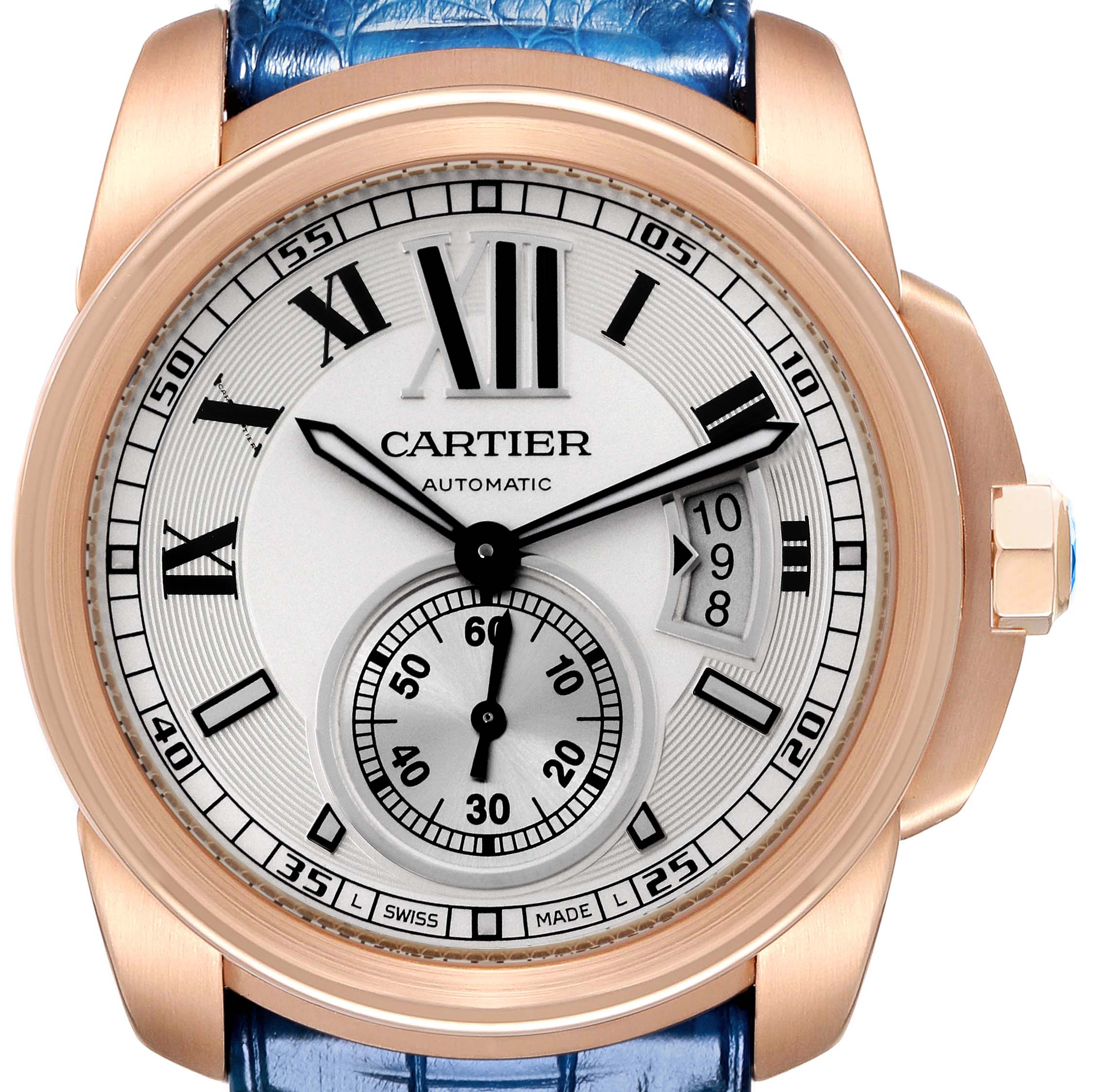 The image shows a front view of the Calibre de Cartier watch by Cartier, displaying the dial, hands, and part of the strap.