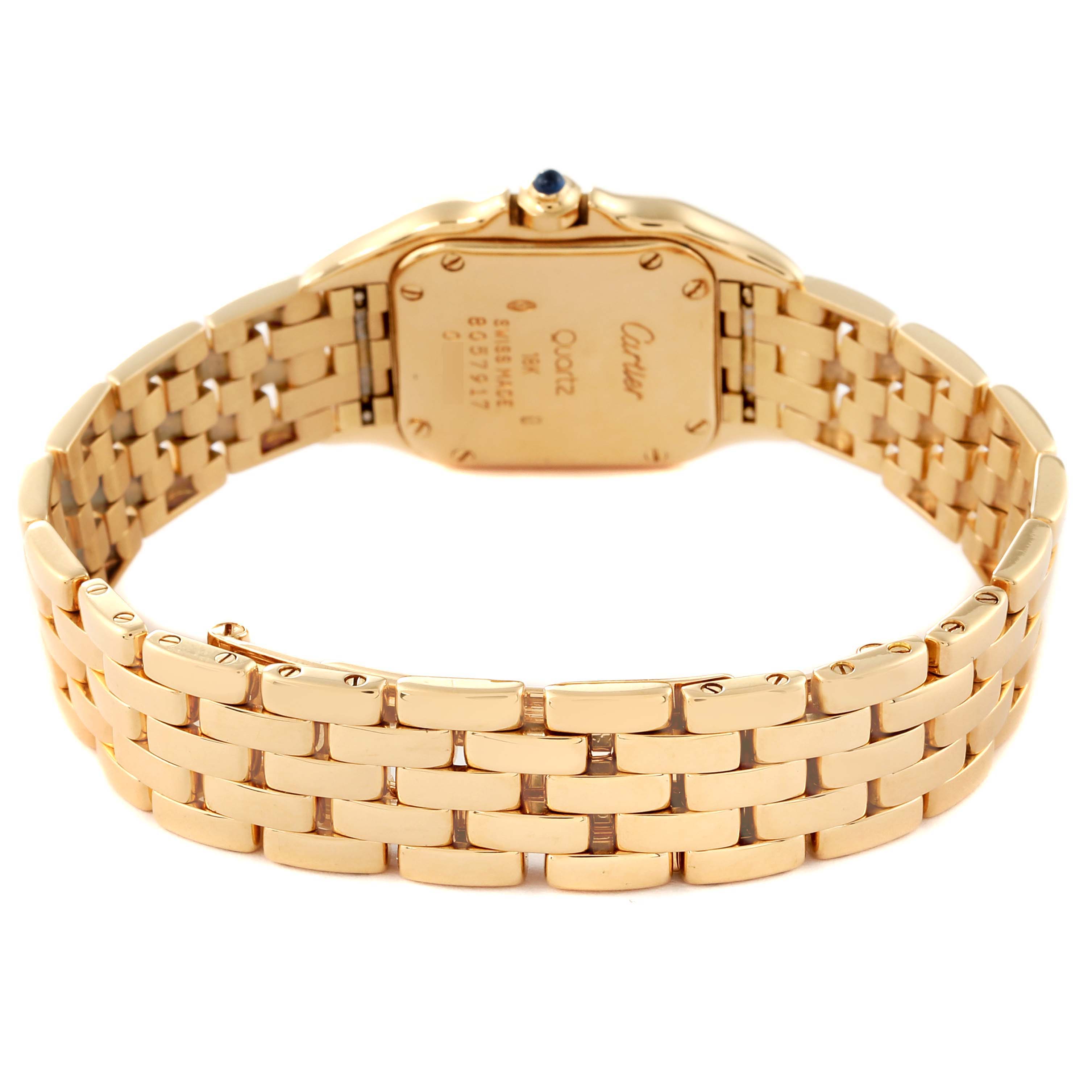 The image shows the back and bracelet of a Panthère model by Cartier in a gold finish, with visible engravings on the case back.