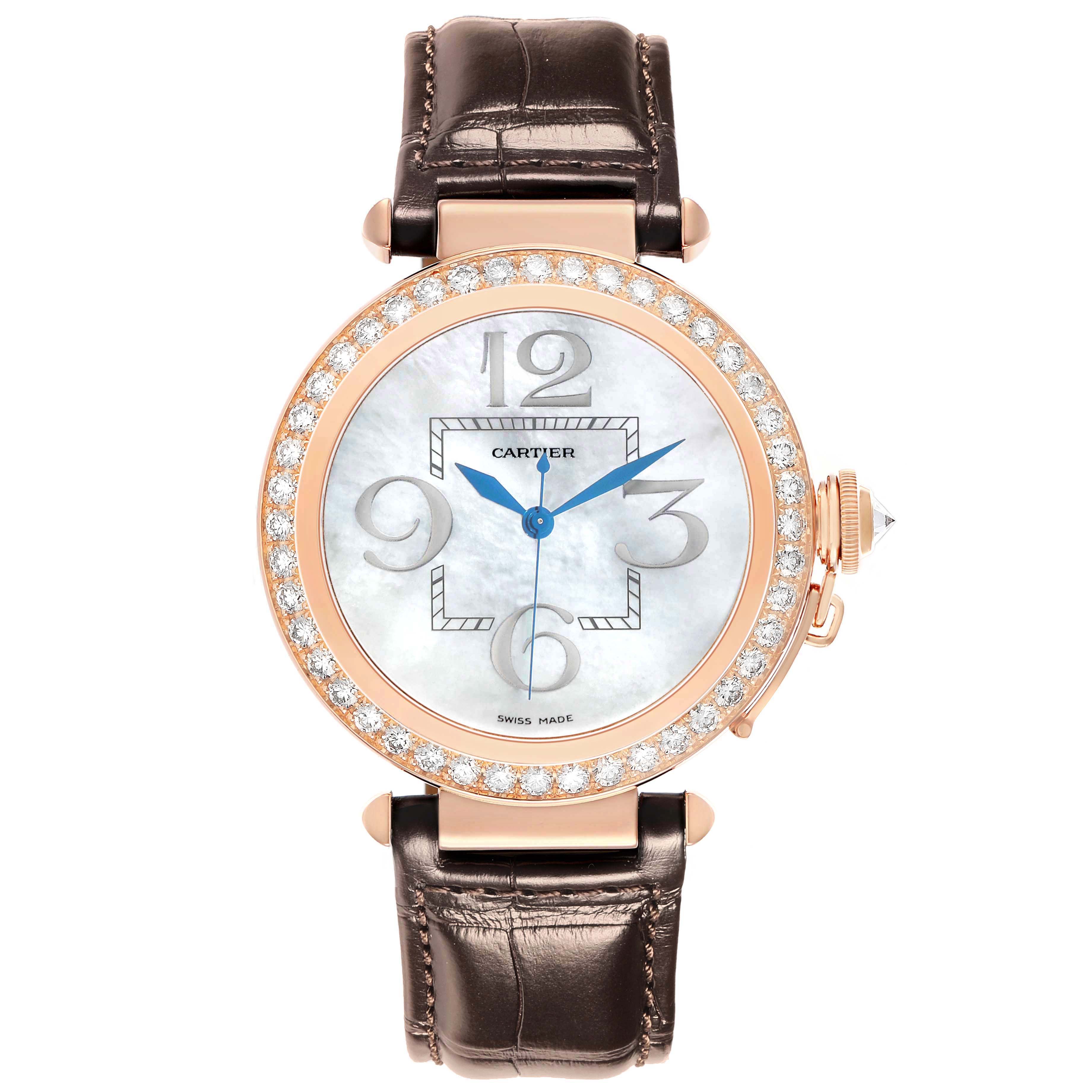 The Cartier Pasha WJ124005 Women
s Rose Gold Mother of Pearl Dial watch is shown from a front angle, displaying the face, bezel with diamonds, crown, and leather strap.