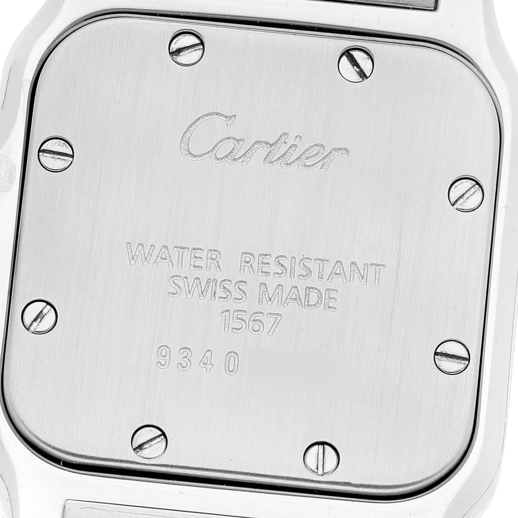 This image shows the backplate of a Cartier Santos W20012C4 Women's Stainless Steel Silver Dial W20012C4 Women's Stainless Steel Silver Dial watch, displaying branding, water resistance, and model information.
