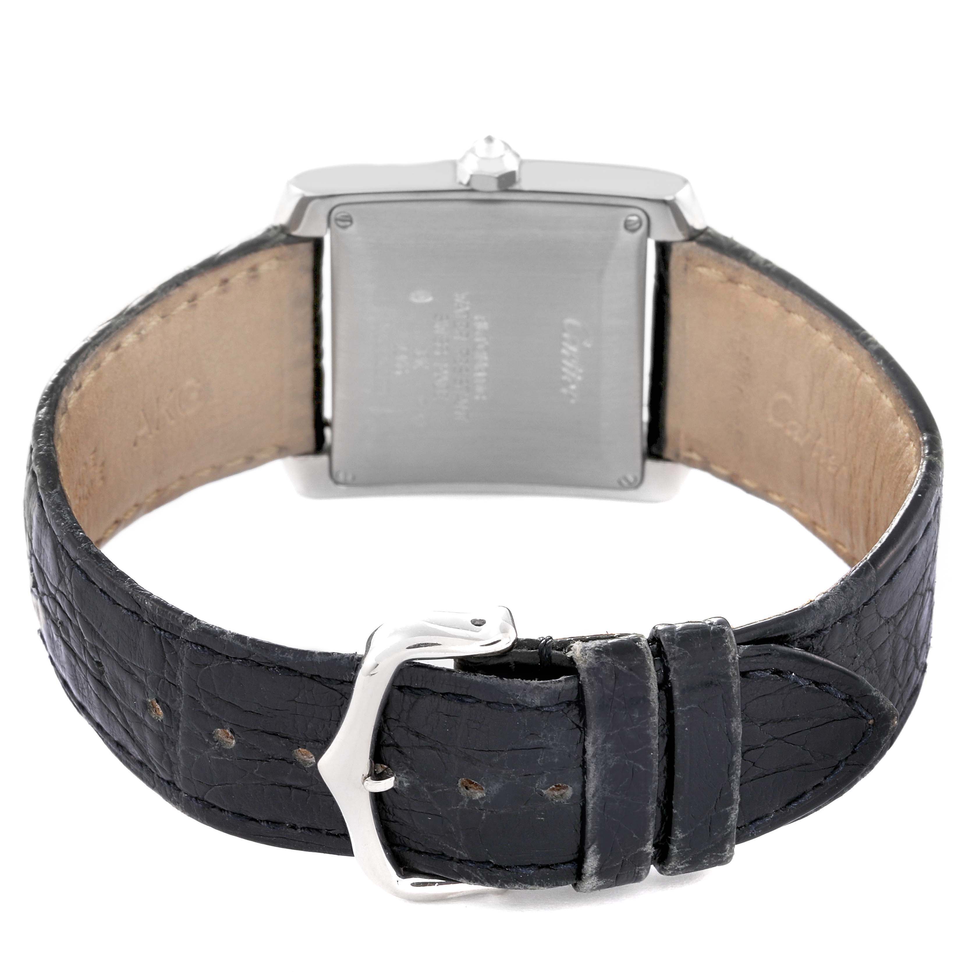 The image shows the back view of a Cartier Tank Francaise 2366 Men
s White Gold Silver Dial 2366 Men
s White Gold Silver Dial watch, highlighting the case back and black leather strap with buckle.