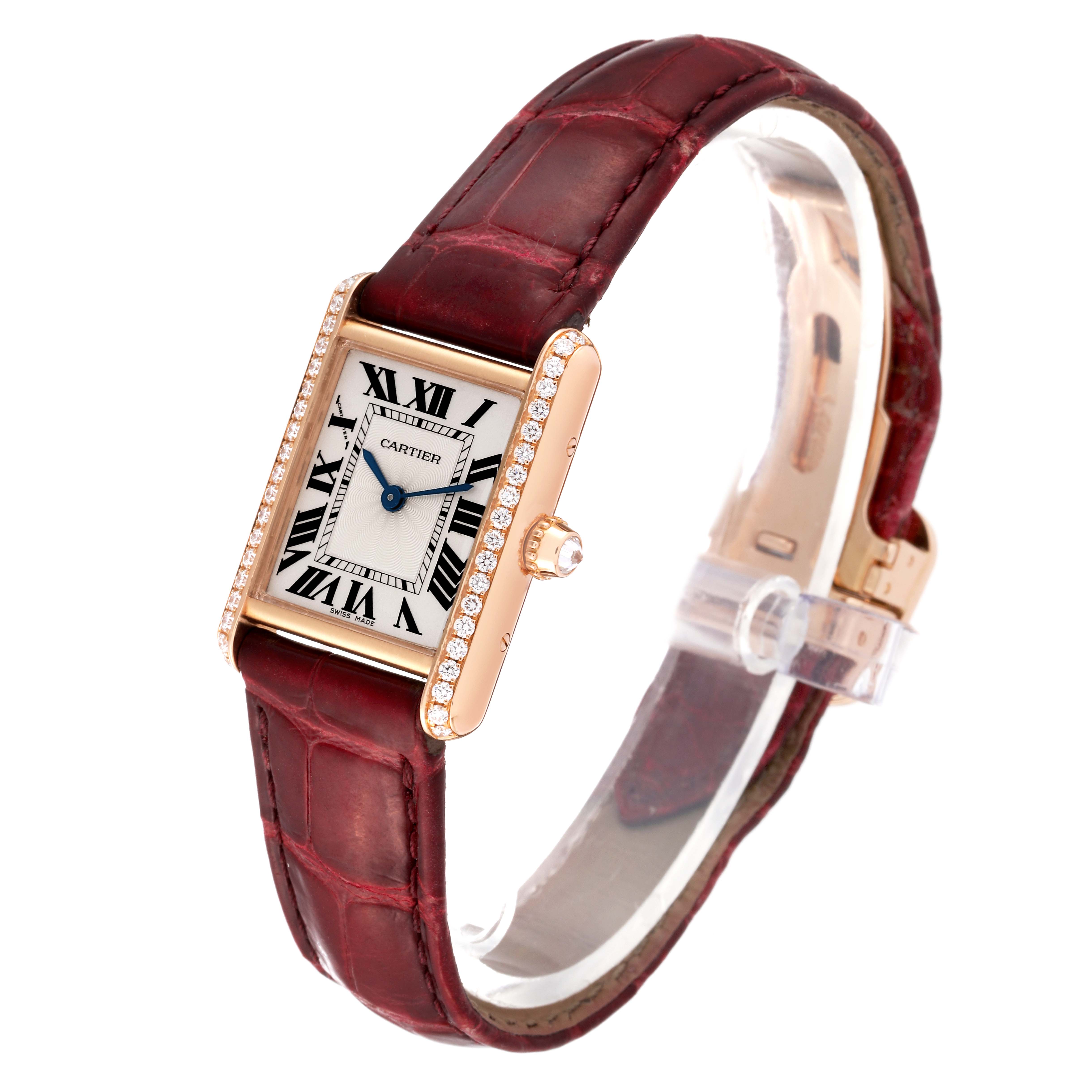 The Cartier Tank Louis WJTA0010 Women's Rose Gold Silver Dial WJTA0010 Women's Rose Gold Silver Dial watch is shown in a three-quarter angle displaying the face, bezel, and red leather strap.