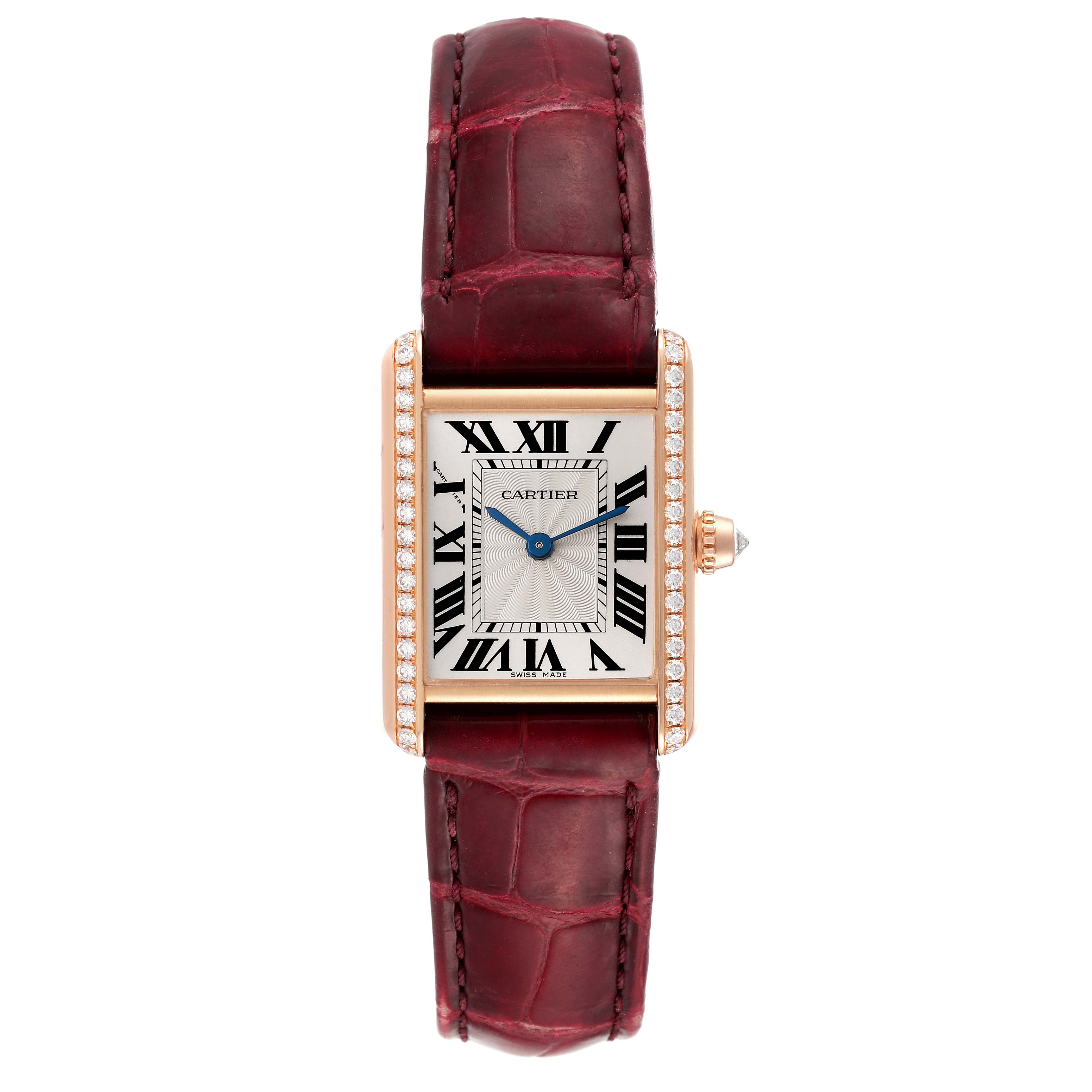 The Cartier Tank Louis WJTA0010 Women's Rose Gold Silver Dial WJTA0010 Women's Rose Gold Silver Dial model watch is shown from a top-down angle, highlighting its rectangular face, diamond bezel, and burgundy leather strap.