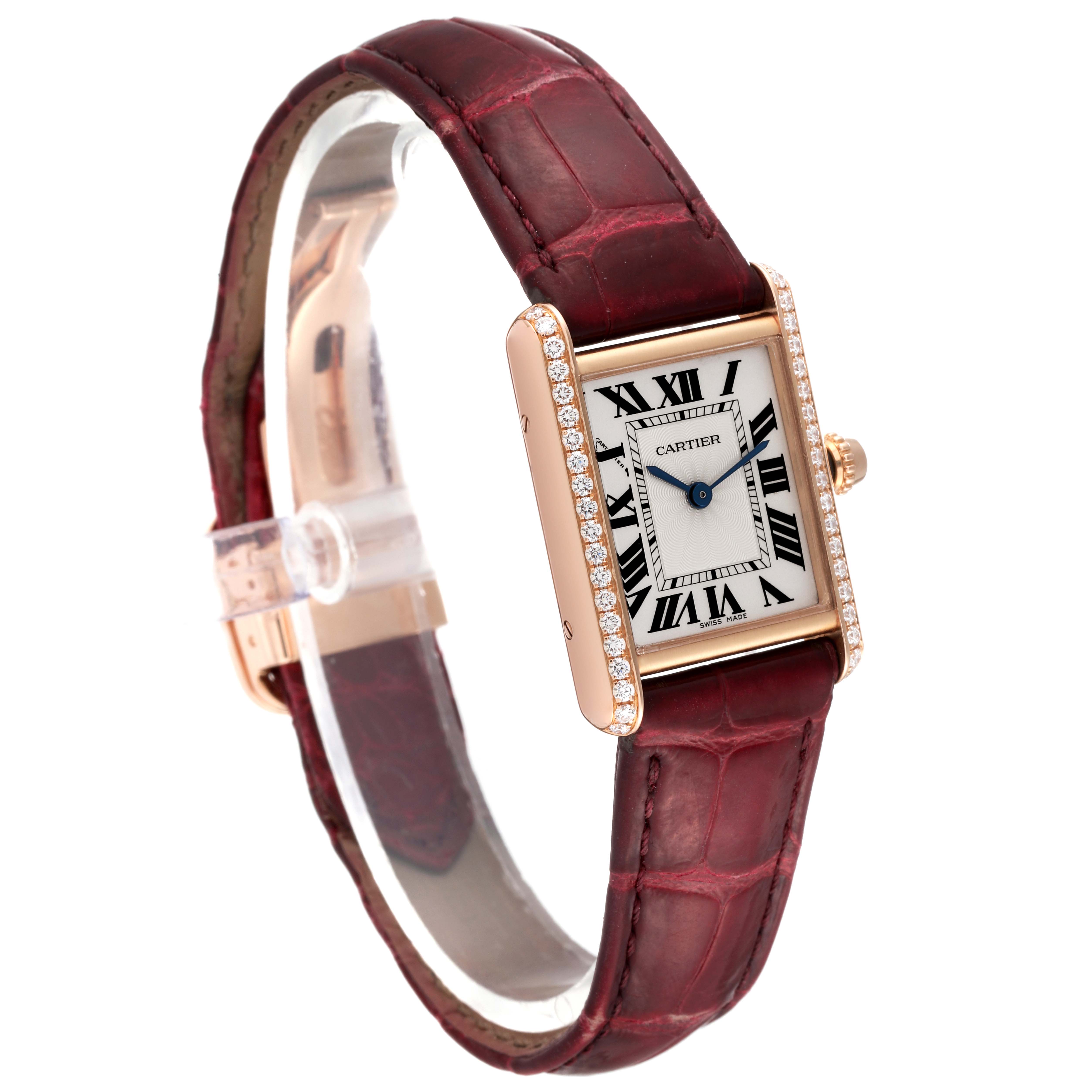 The Cartier Tank Louis WJTA0010 Women's Rose Gold Silver Dial WJTA0010 Women's Rose Gold Silver Dial watch is shown at a slight angle, highlighting its face, side, and maroon leather strap.