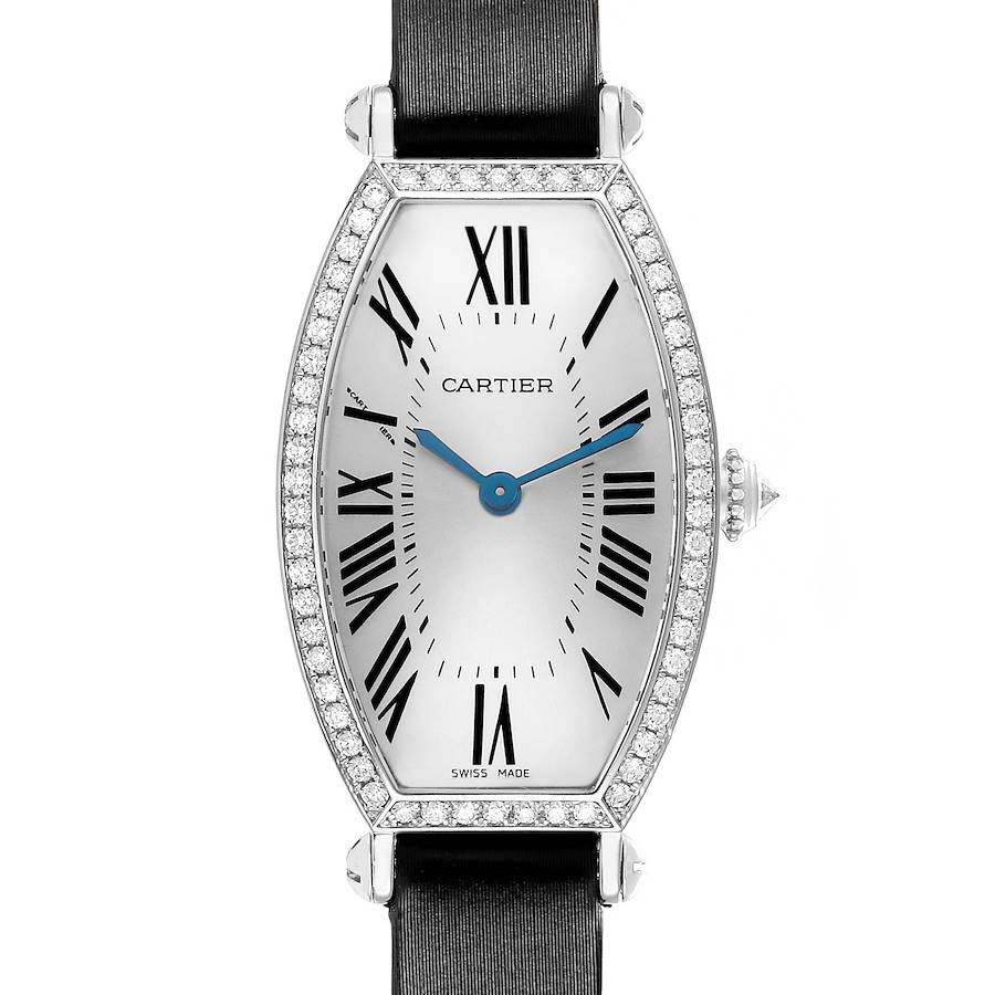 The Cartier Tonneau WE400131 Women's White Gold Silver Dial watch is shown from the front, displaying the face, Roman numerals, blue hands, and diamond bezel.
