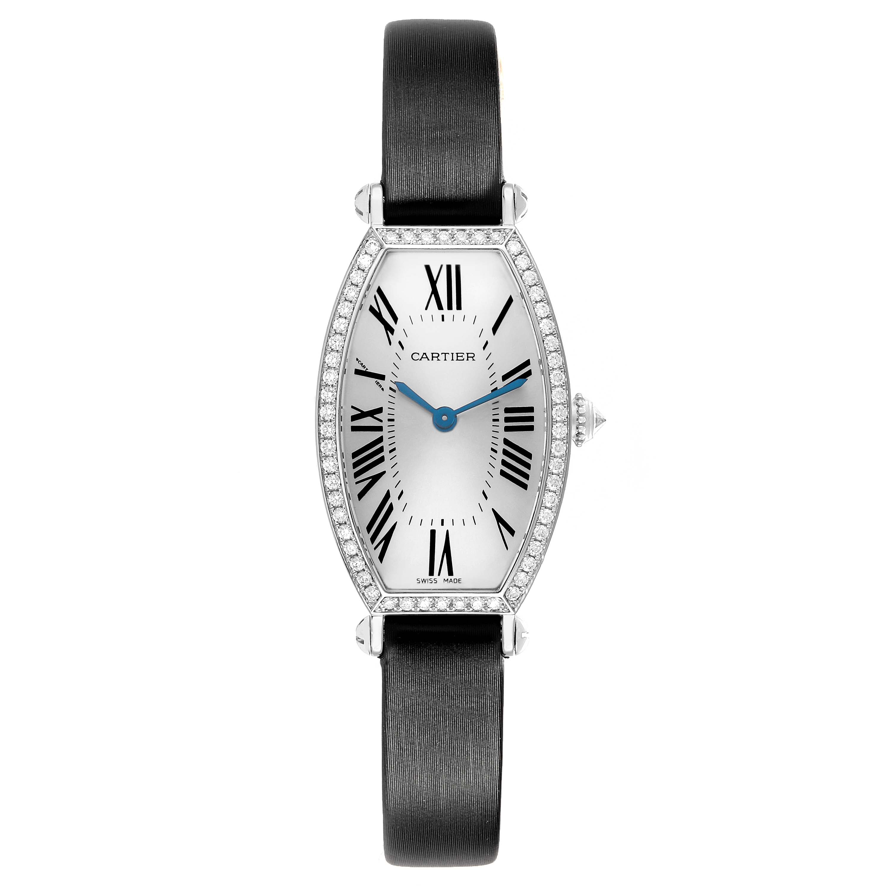 The Cartier Tonneau WE400131 Women
s White Gold Silver Dial watch is shown from a front angle, highlighting its elongated case, Roman numerals, and black strap.