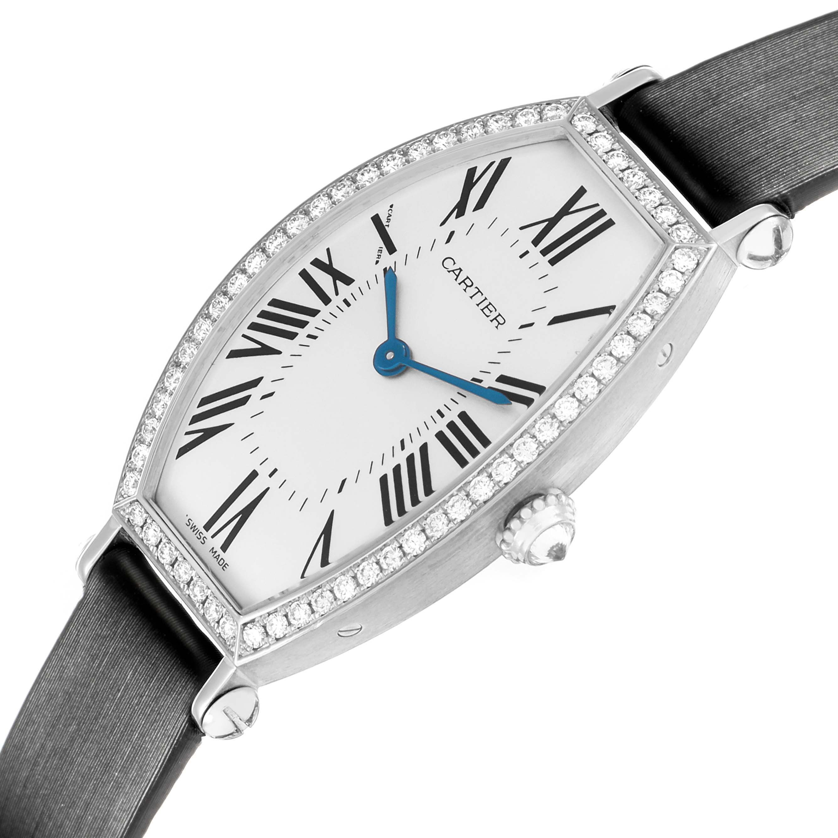The Cartier Tonneau WE400131 Women
s White Gold Silver Dial watch is shown at a tilted angle, highlighting its diamond-set bezel, Roman numerals, and blue hands.