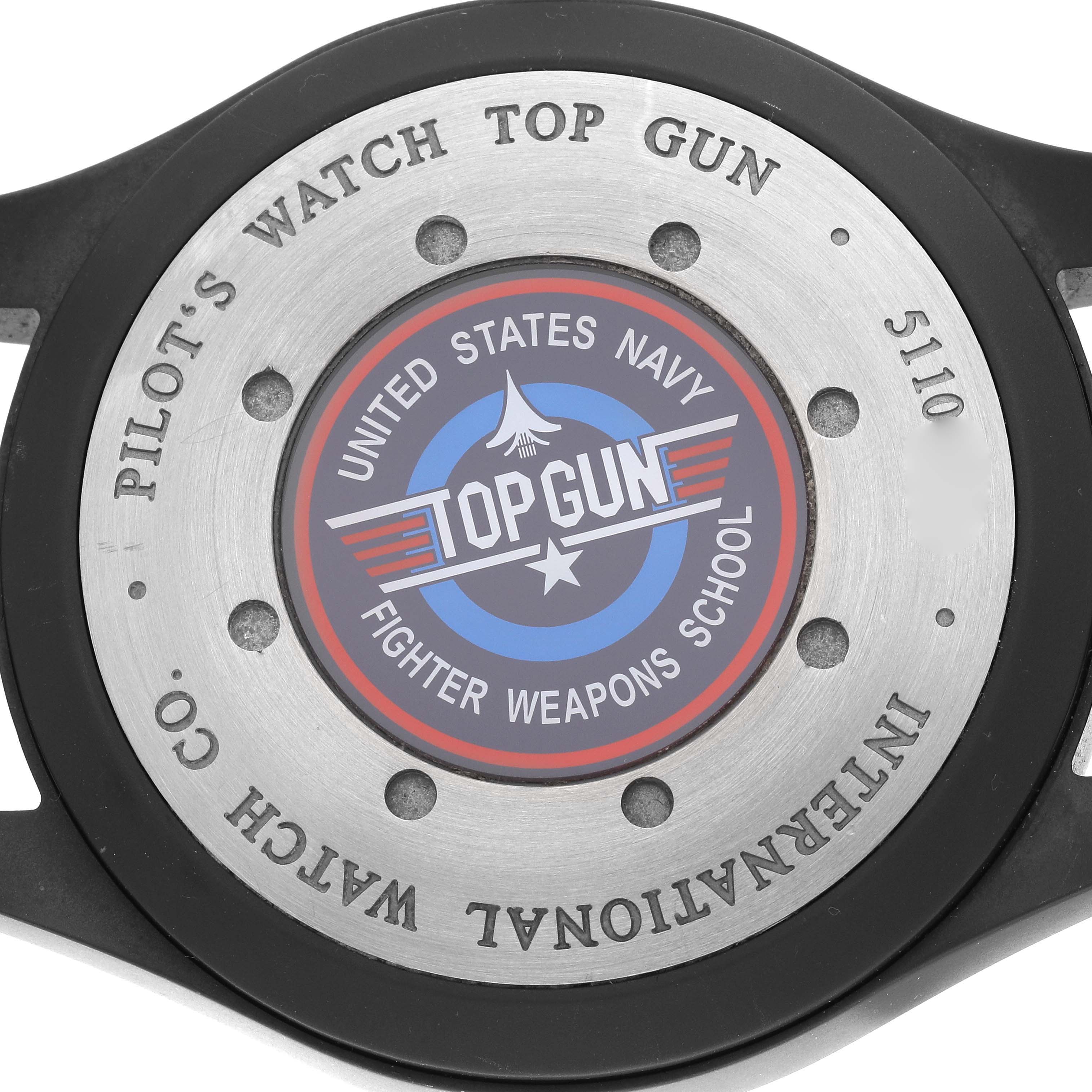 The image shows the case back of the IWC Pilot IW501901 Men
s Ceramic Black Dial IW501901 Men
s Ceramic Black Dial
s Watch Top Gun model, featuring an engraving and logo.